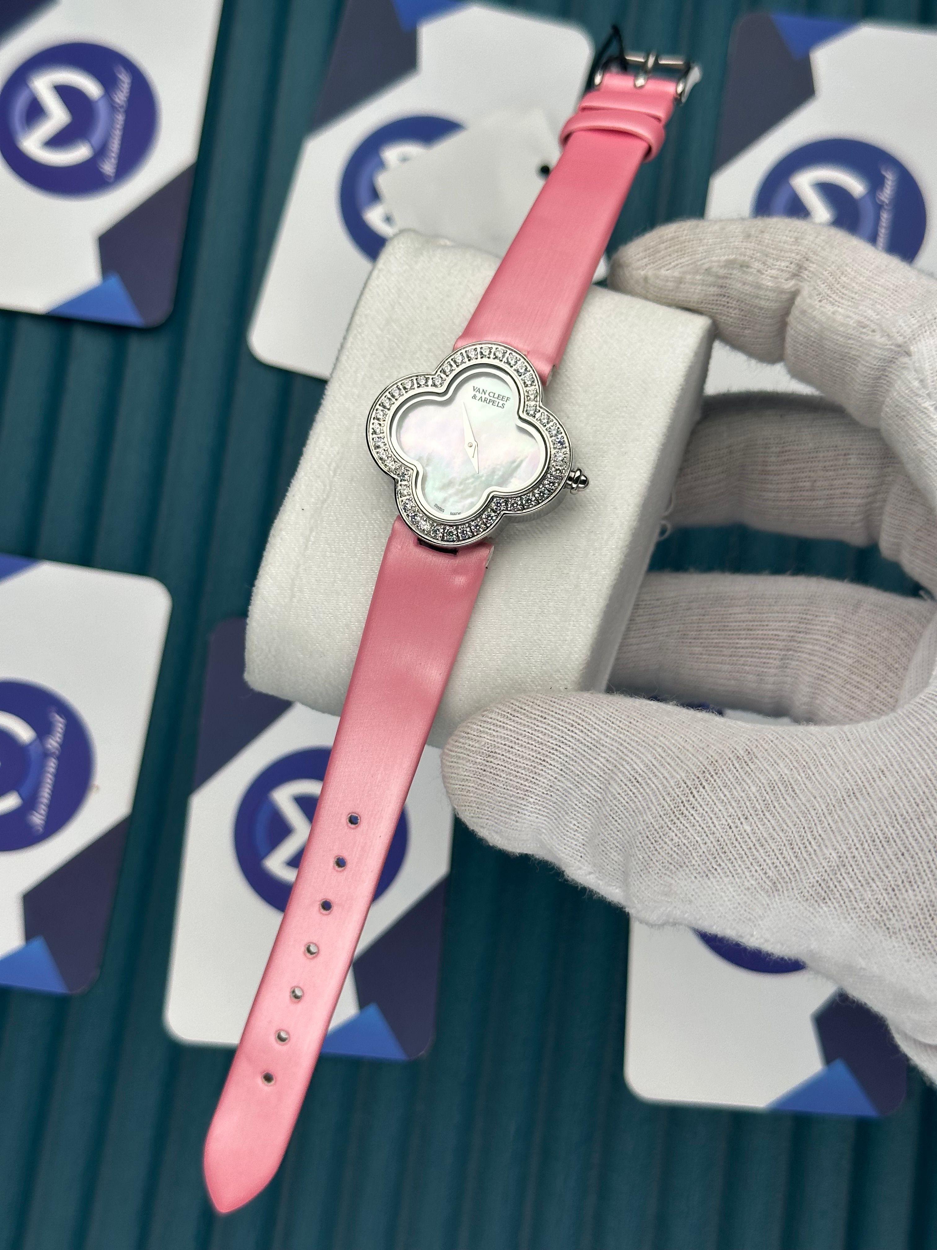 VAN CLEEF & ARPELS WHITE DIAL DIAMOND BEZEL SILVER CASE PINK LEATHER CORD