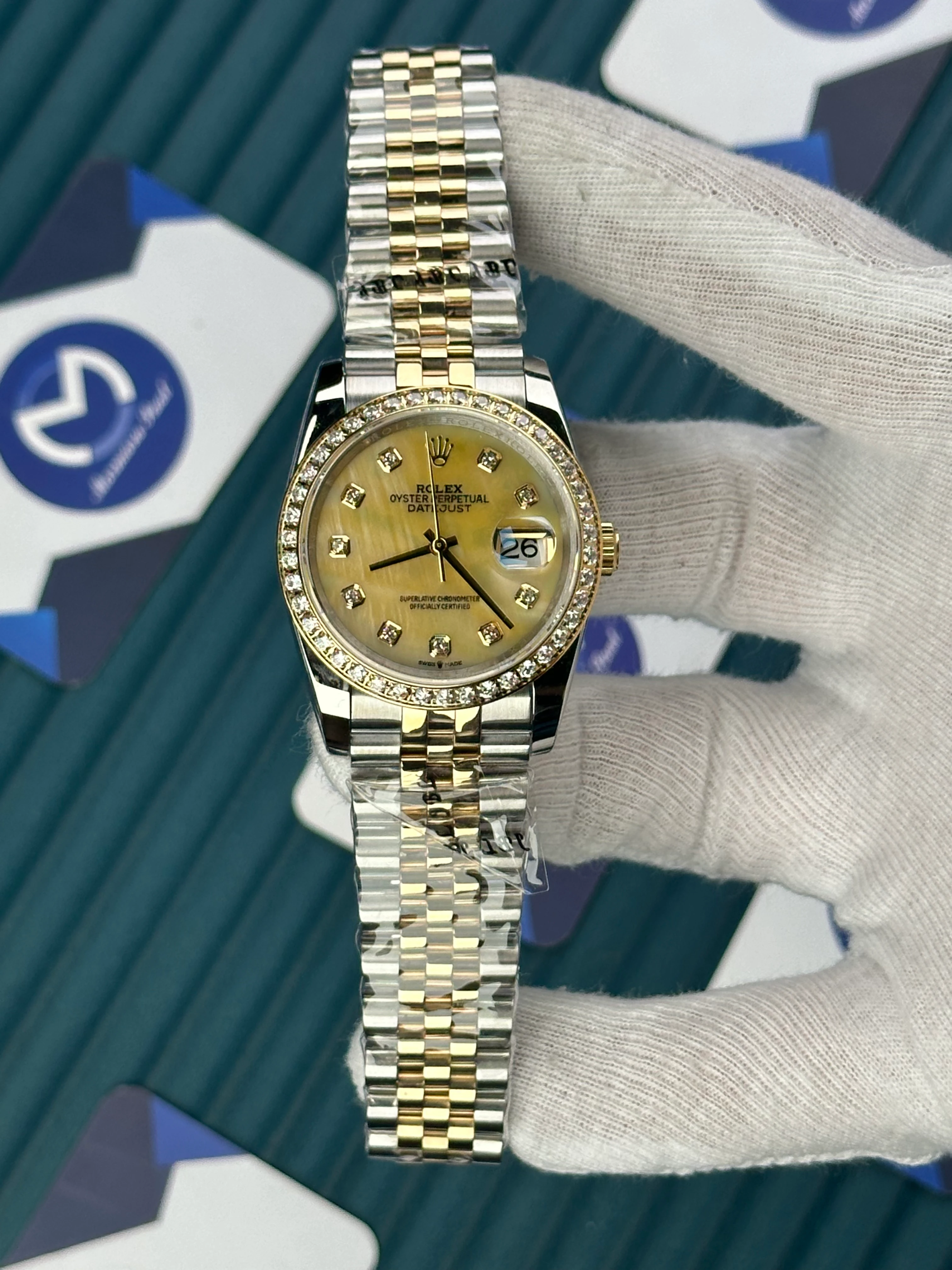 ROLEX 36 MM DATEJUST CHAMPAGNE DIAL DIAMOND INDEX AND BEZEL GOLD-SILVER JUBILE 