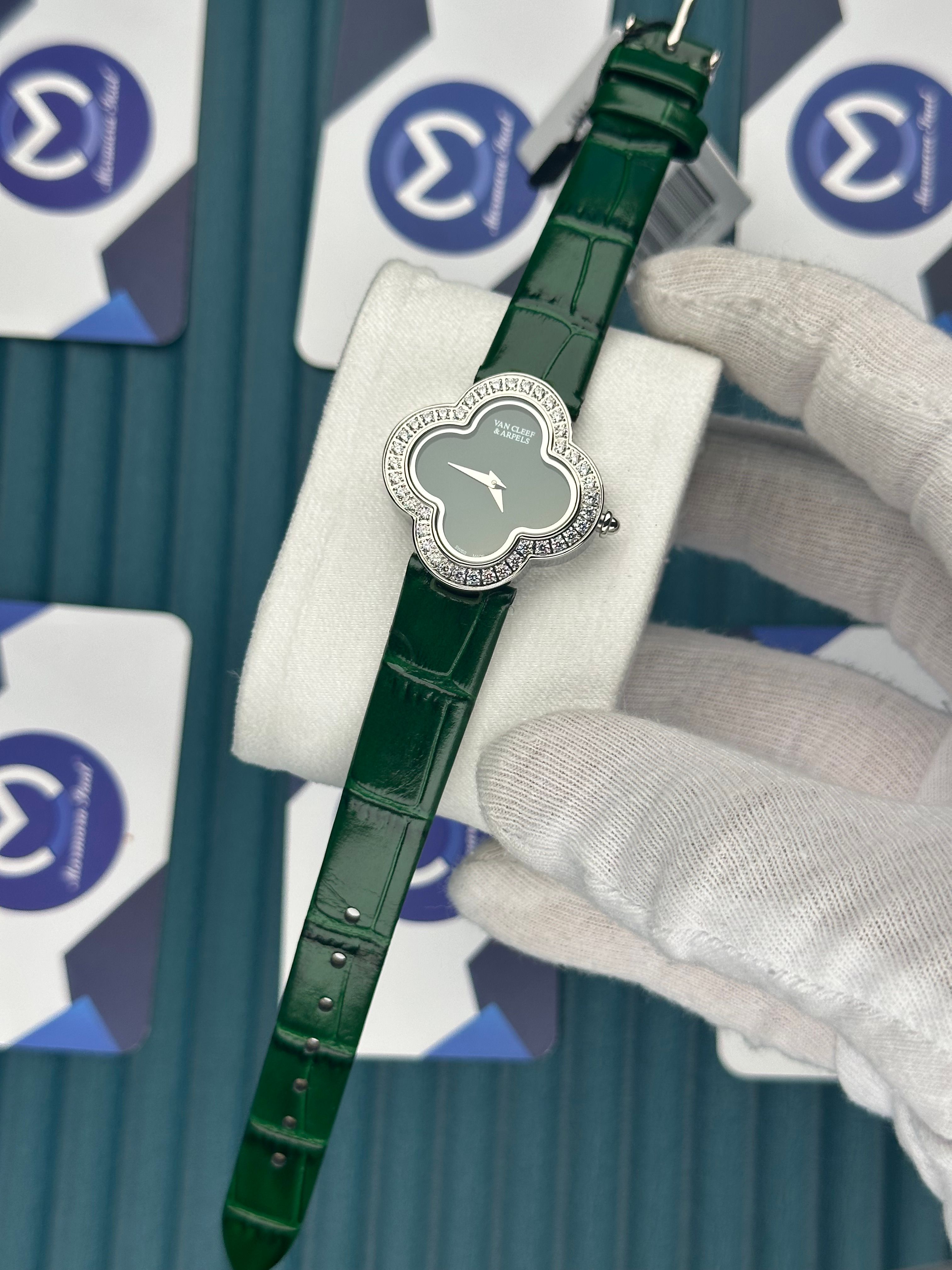 VAN CLEEF & ARPELS GREEN DIAL DIAMOND BEZEL SILVER CASE GREEN LEATHER CORD