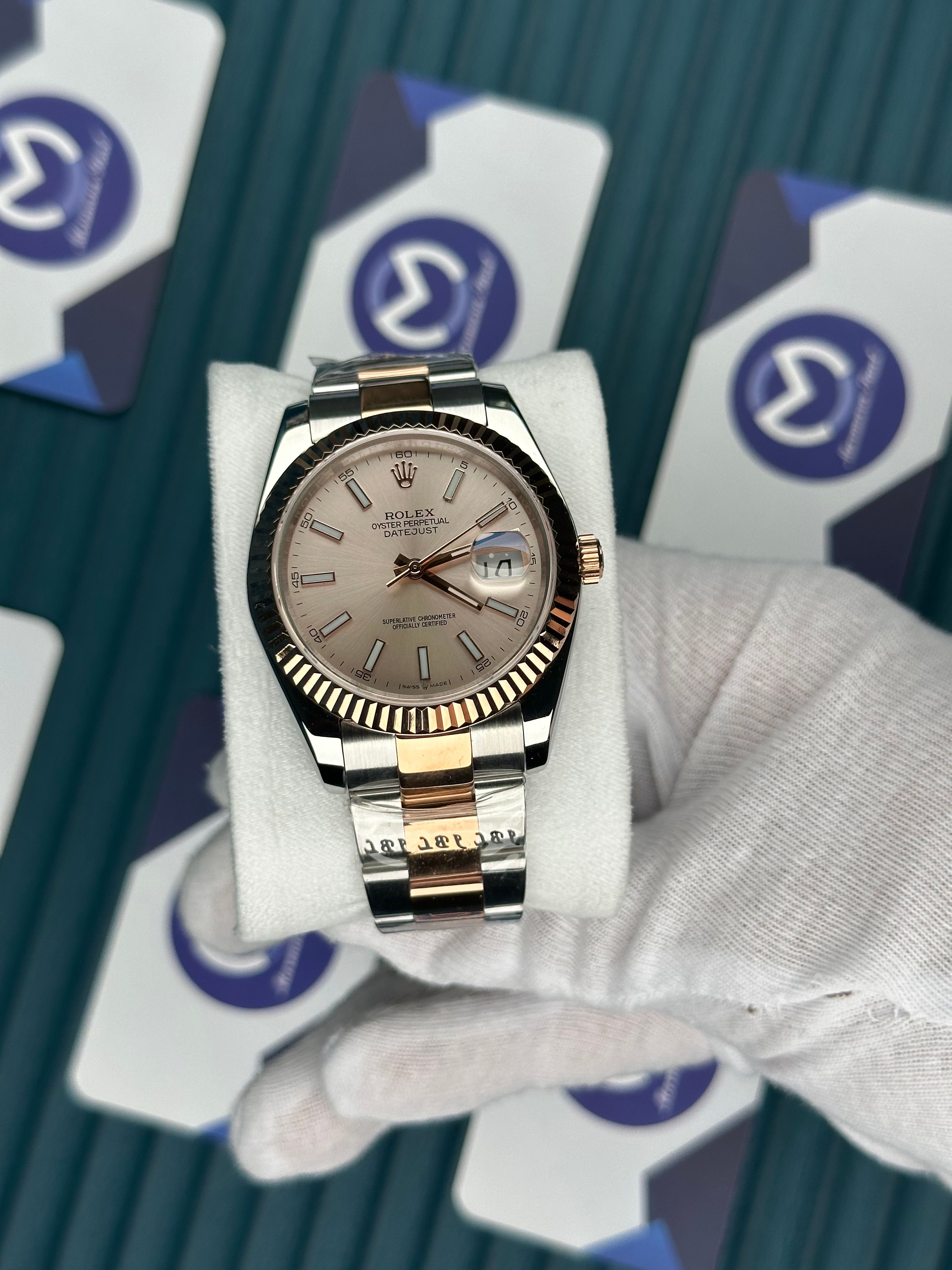 ROLEX DATEJUST OVAL BEZEL CHAMPAGNE DIAL ROSE-SILVER OYSTER