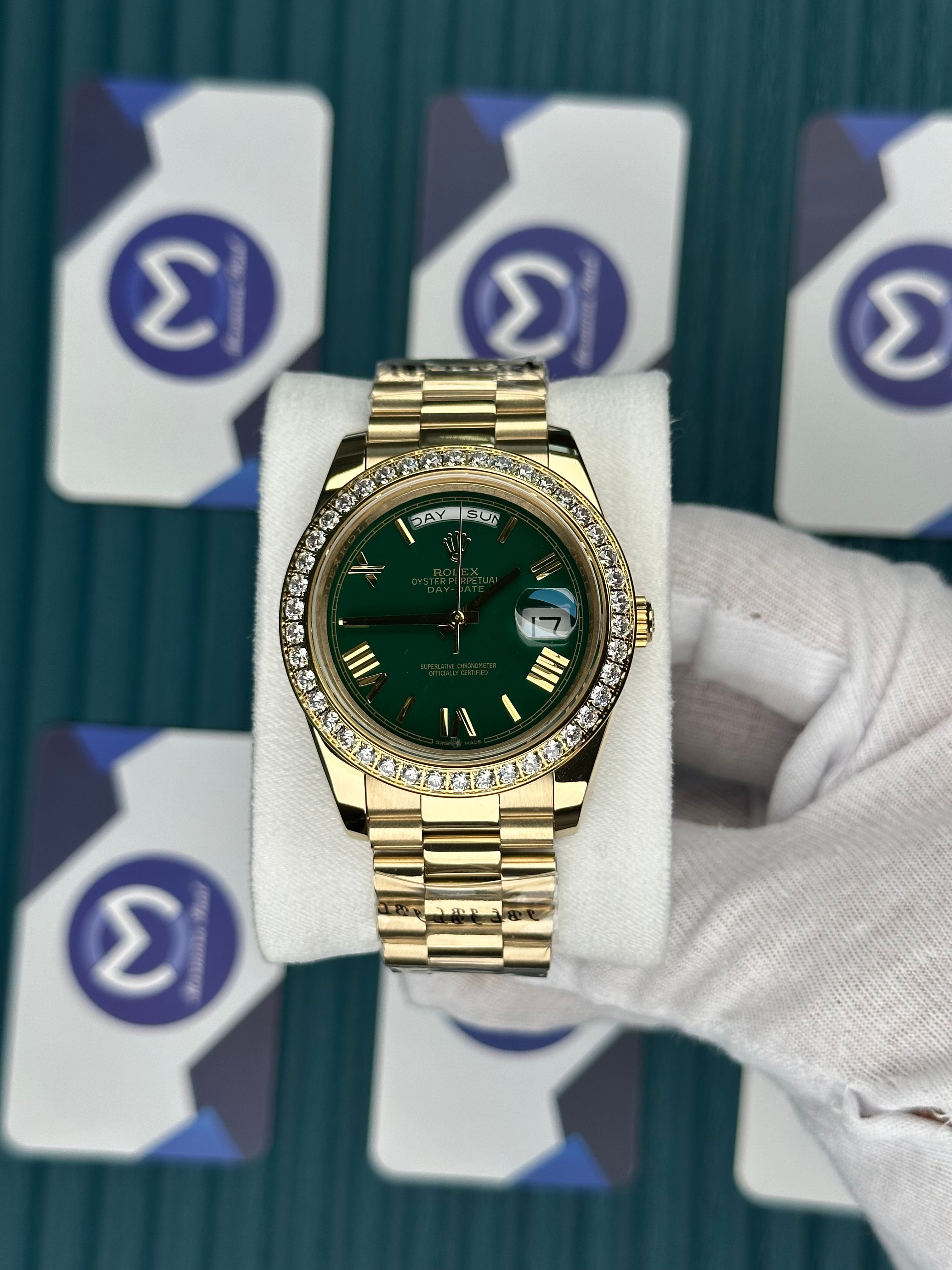 ROLEX DAY-DATE GREEN DIAL ROMA INDEX DIAMOND BEZEL GOLD PRESIDENT