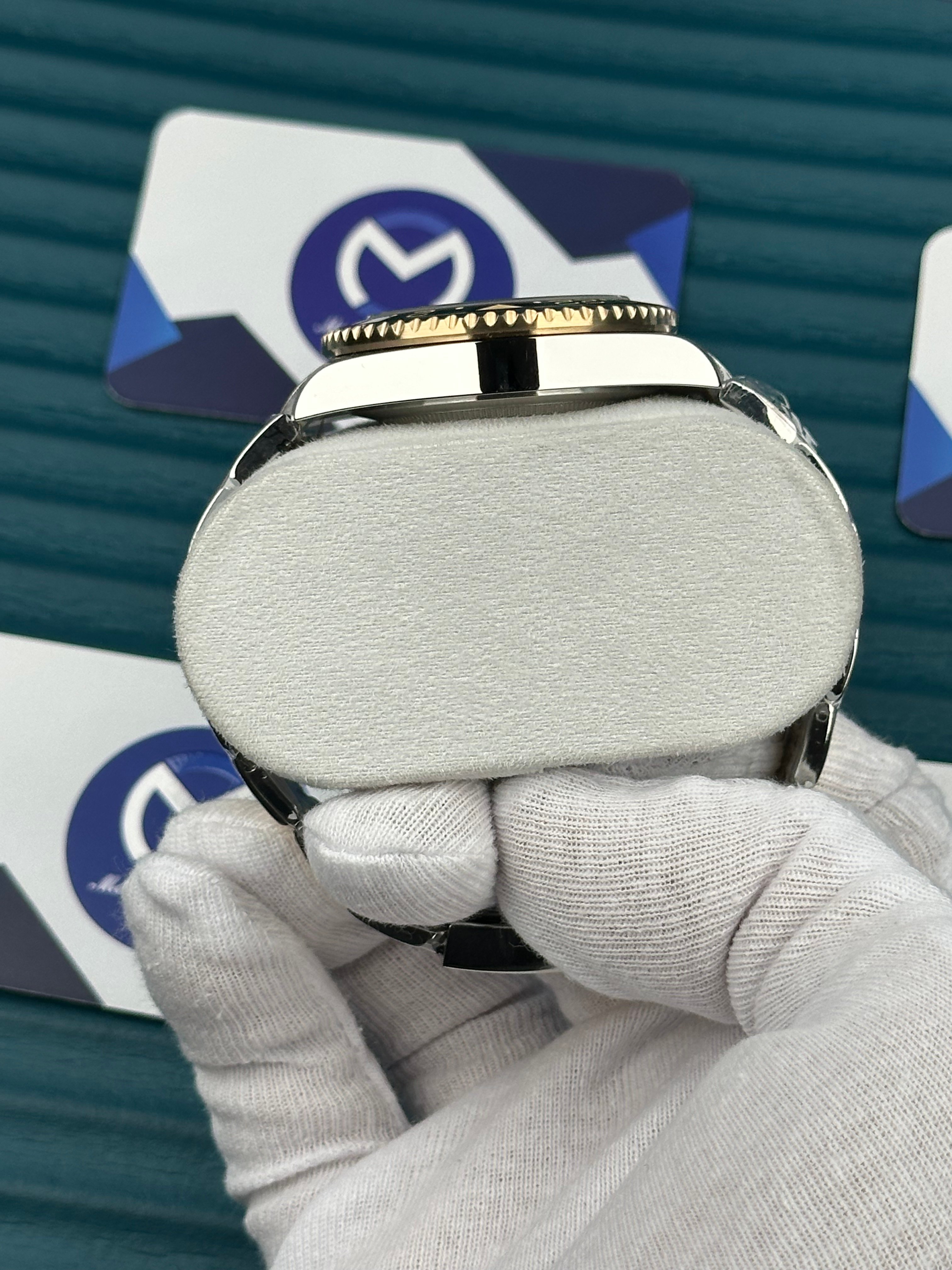 ROLEX SUBMARINER BLACK DIAL GOLD-SILVER OYSTER