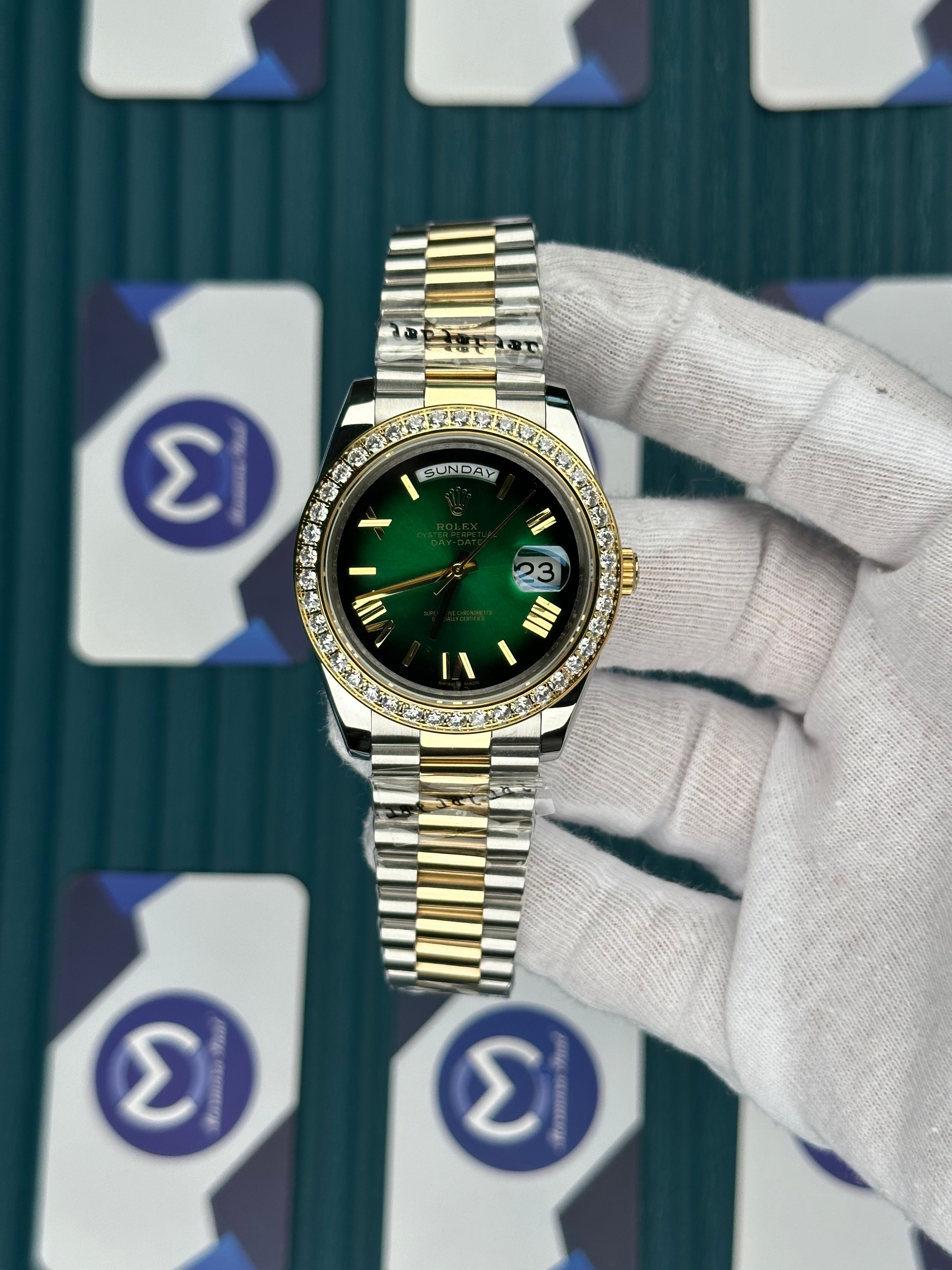 ROLEX DAY-DATE GREEN DIAL ROMA INDEX DIAMOND BEZEL GOLD-SILVER PRESIDENT
