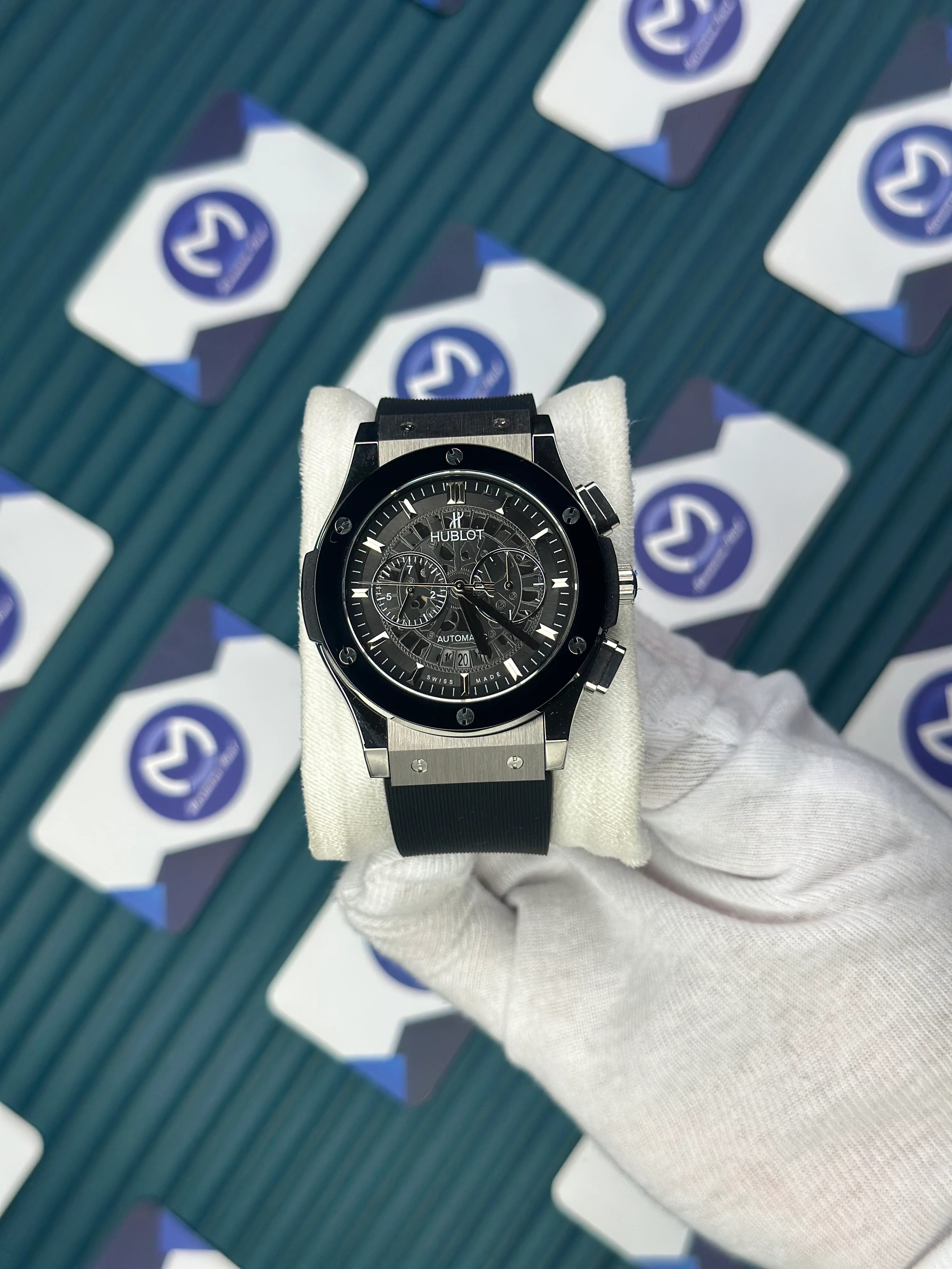 HUBLOT AUTOMATIC CHRONOGRAP SKELETON BLACK BEZEL SILVER CASE BLACK RUBBER CORD 