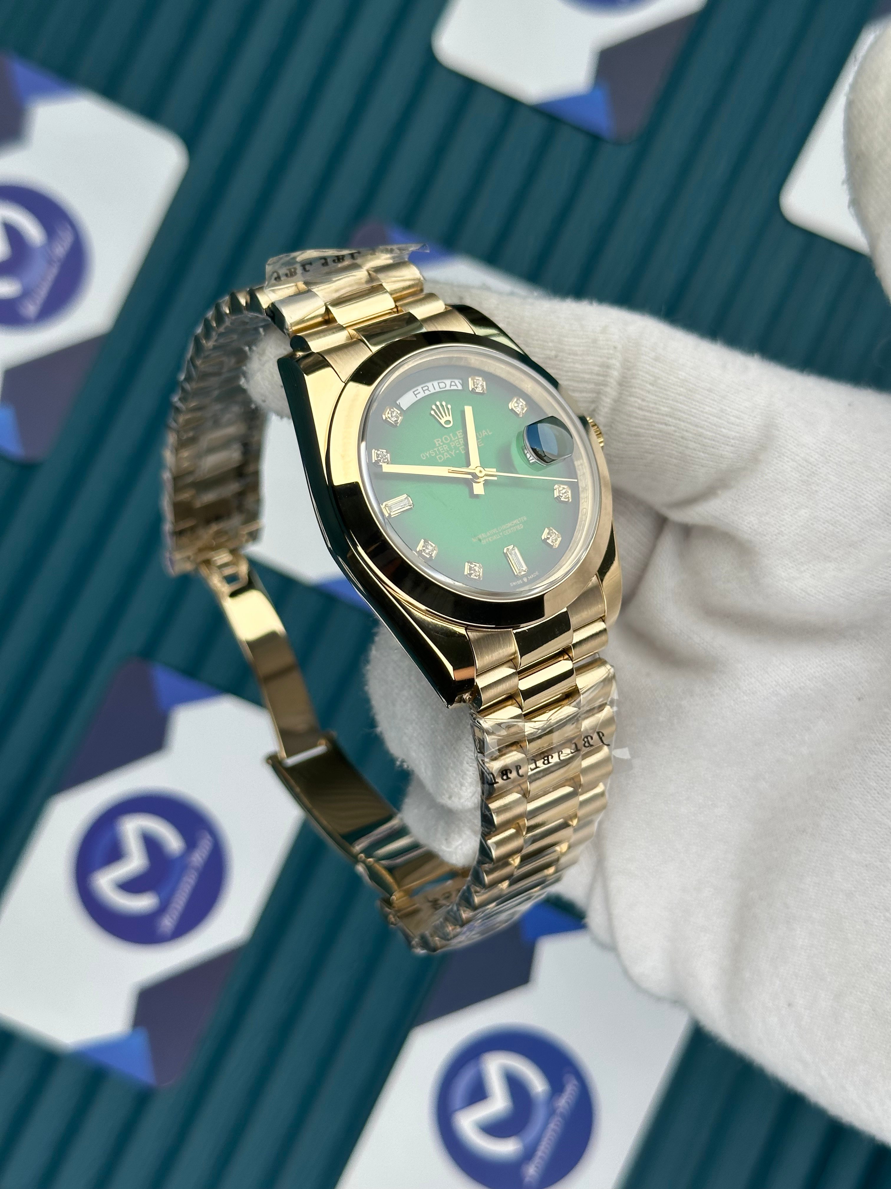 ROLEX DAY-DATE GREEN DIAL OVAL BEZEL DIAMOND INDEX GOLD PRESIDENT