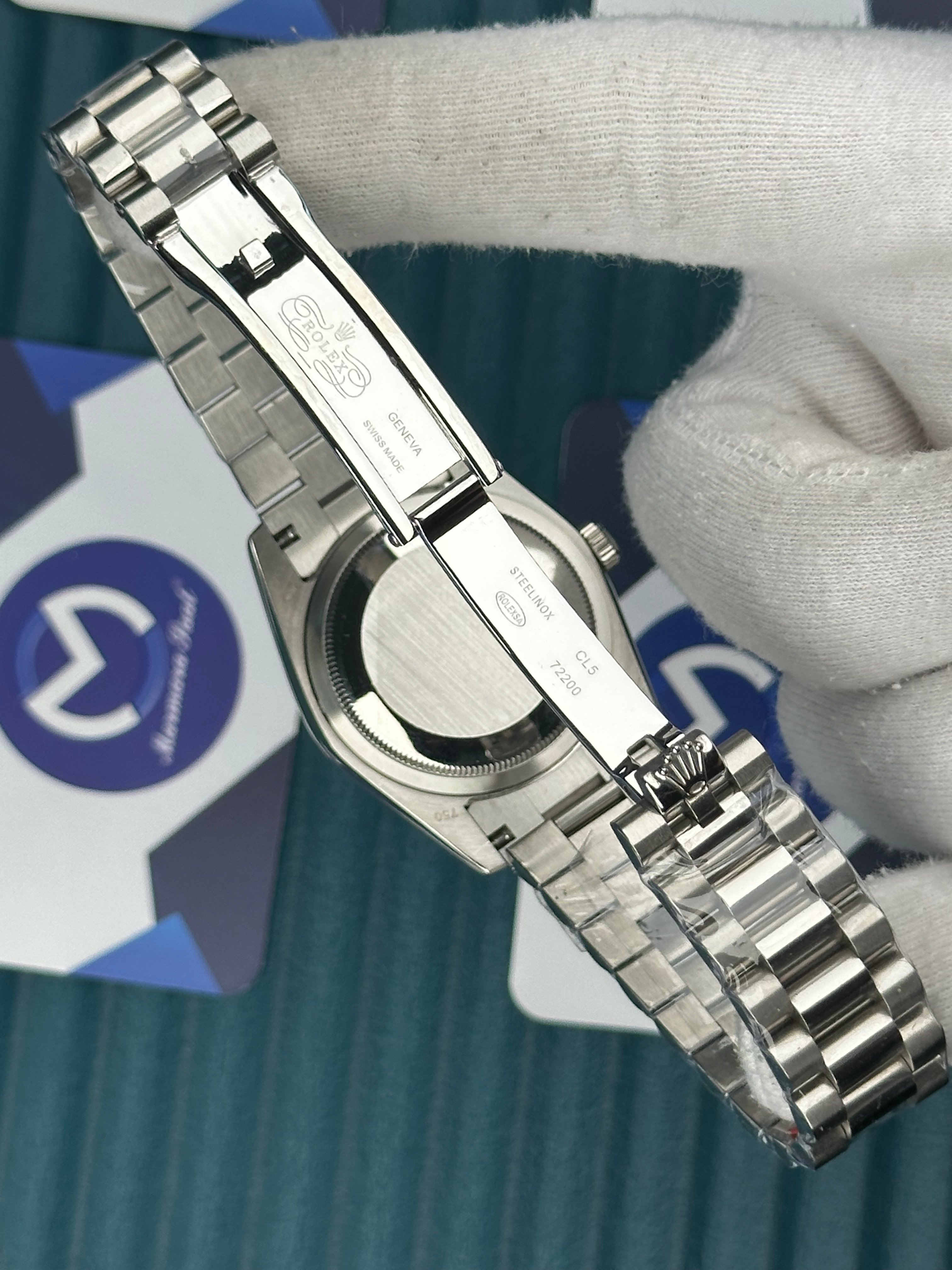 ROLEX 36 DAYDATE DIAMOND GREEN DIAL SILVER PRESIDENT