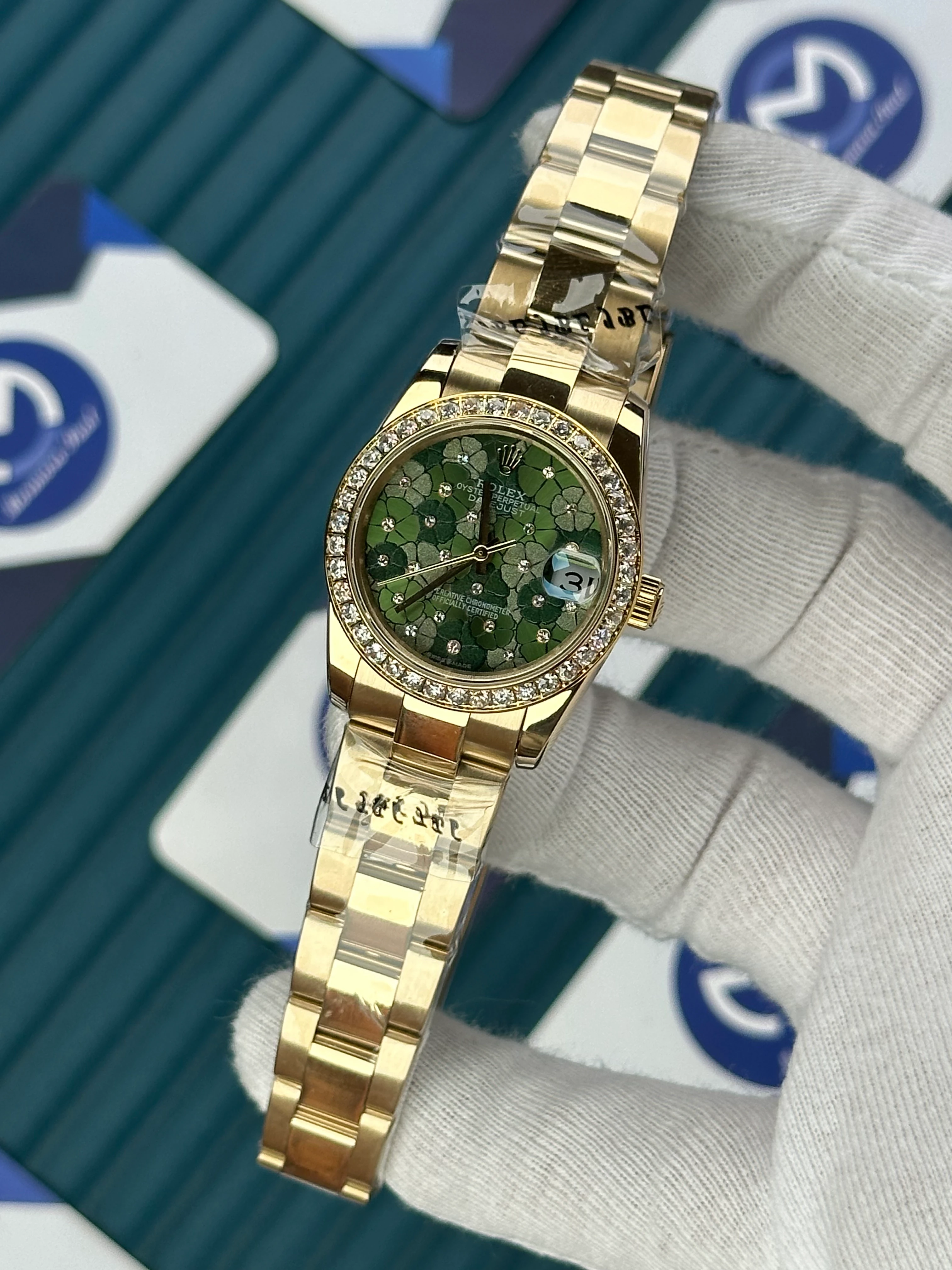 ROLEX 31 MM DATEJUST GREEN FLOWERS PATTERNED DIAL DIAMOND BEZEL GOLD OYSTER 
