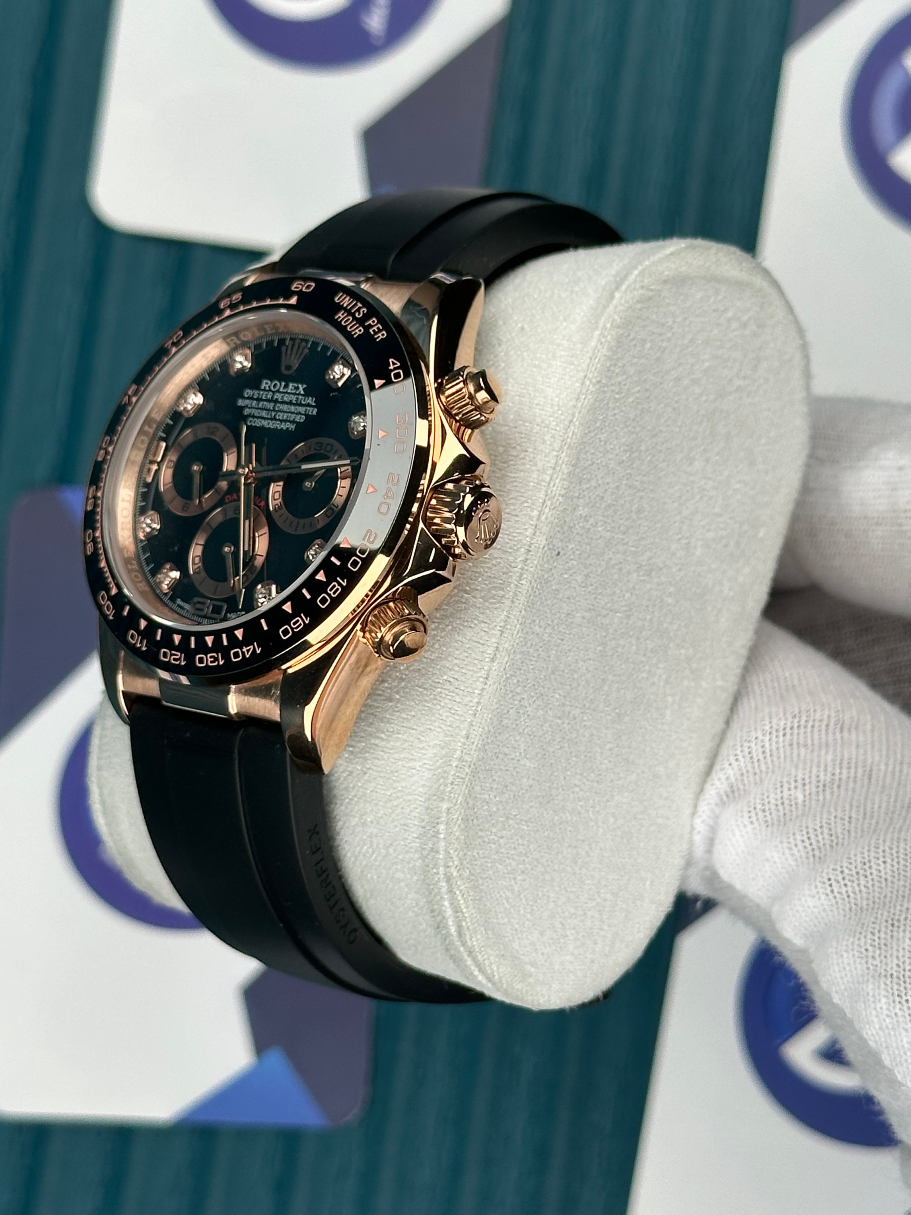 ROLEX DAYTONA BLACK DIAL DIAMOND INDEX ROSE CASE OYSTERFLEX
