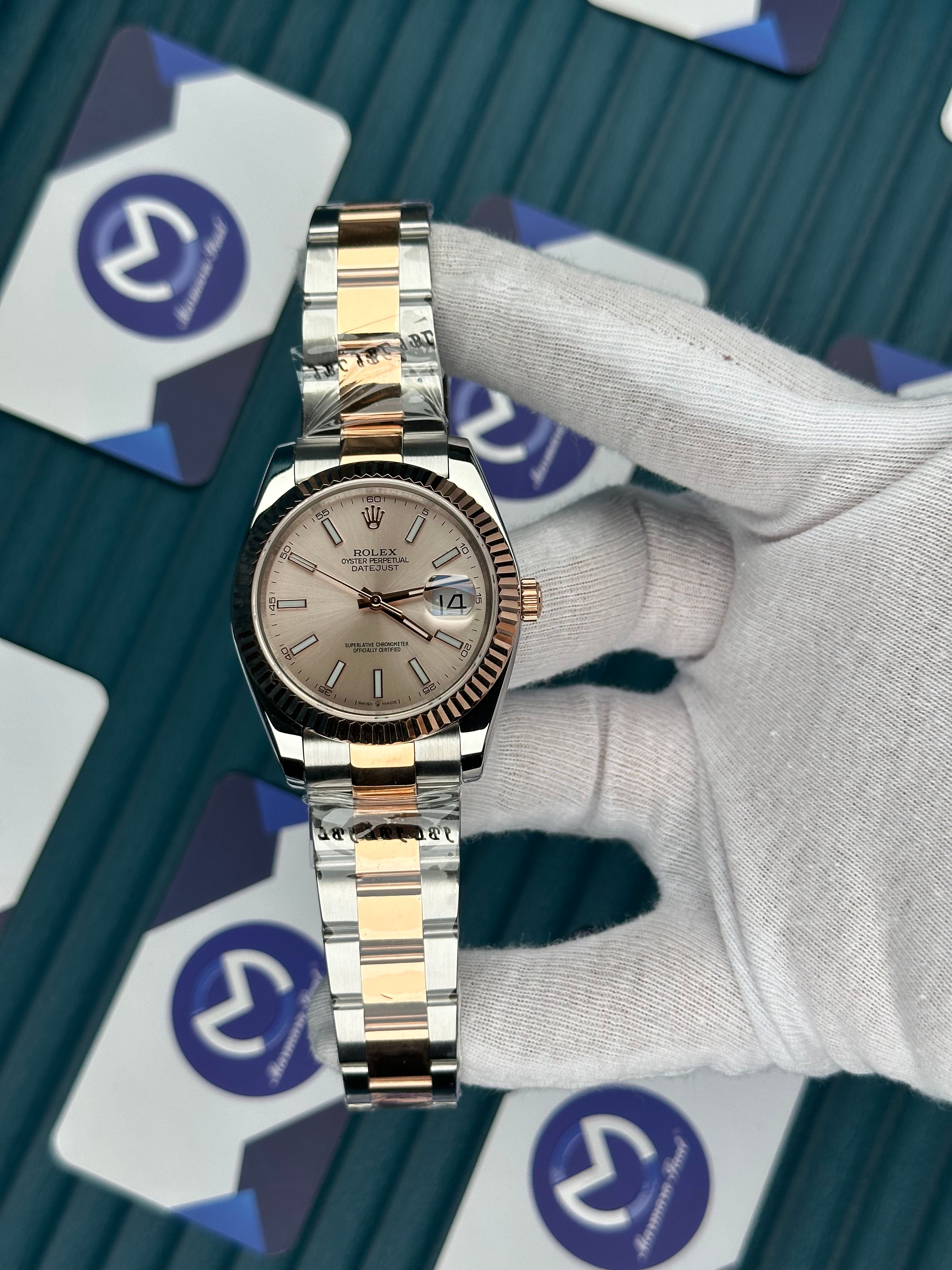 ROLEX DATEJUST OVAL BEZEL CHAMPAGNE DIAL ROSE-SILVER OYSTER