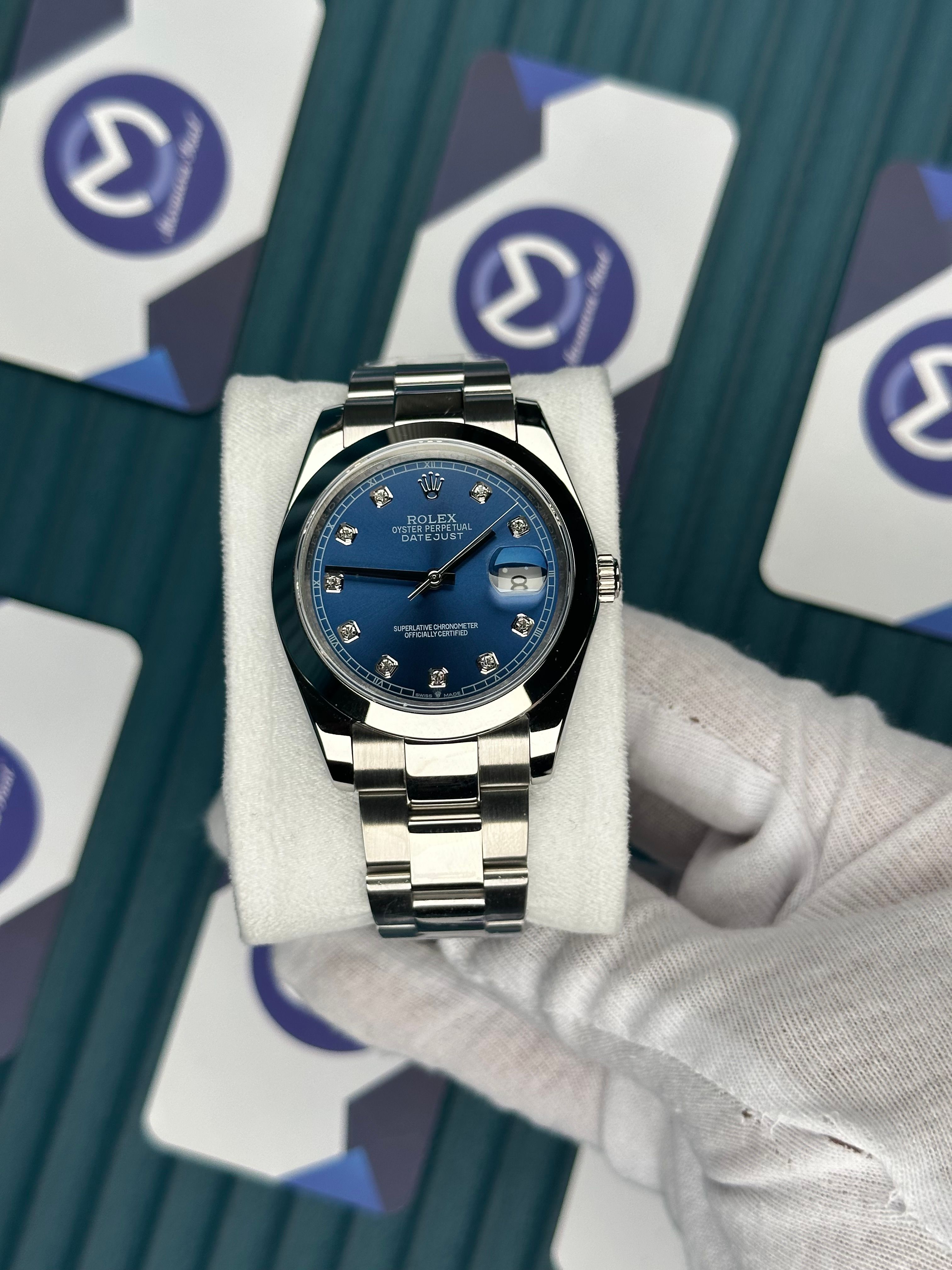 ROLEX DATEJUST BLUE DIAL OVAL BEZEL DIAMOND INDEX SILVER OYSTER