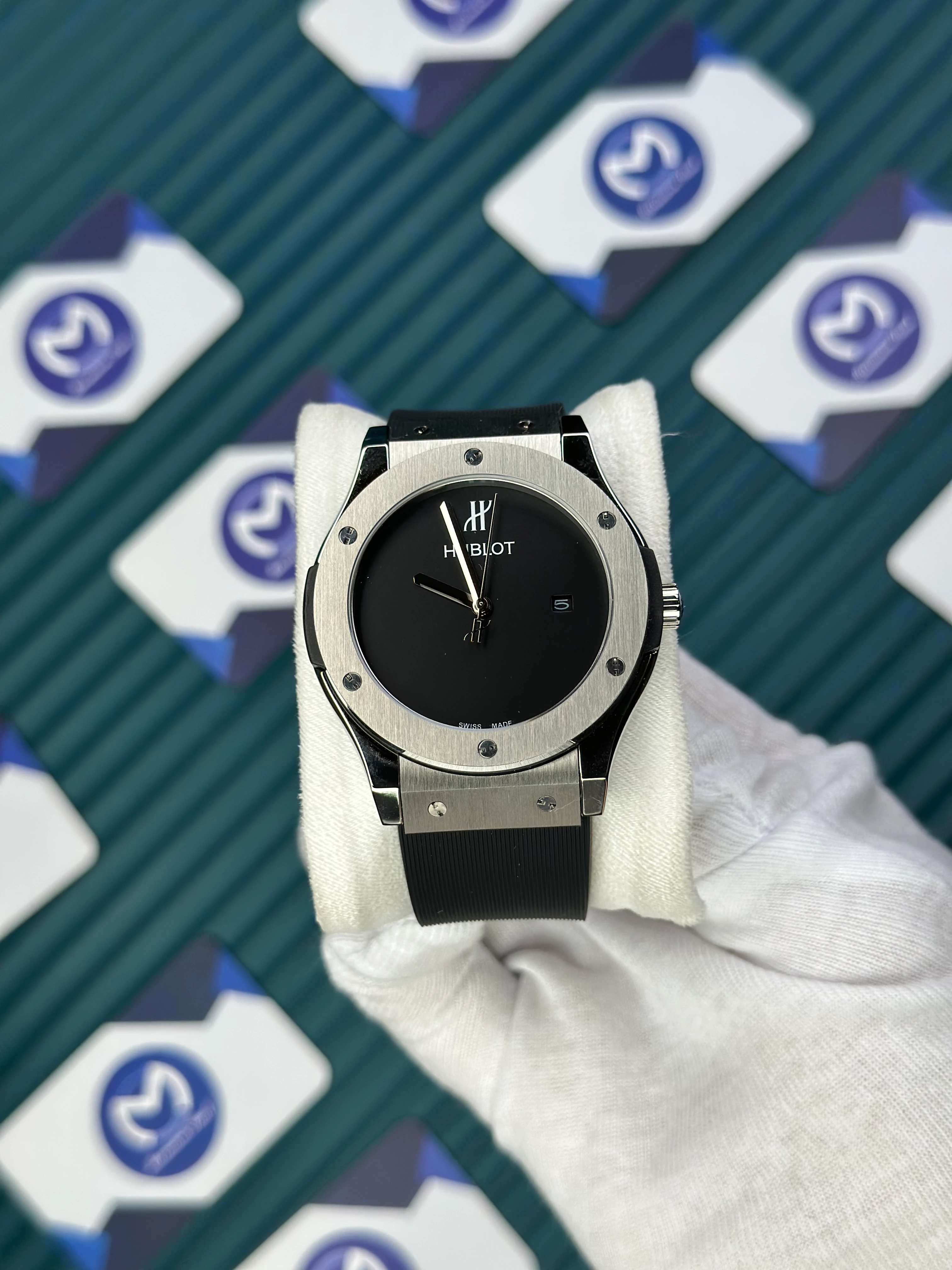 HUBLOT GENEVE AUTOMATIC VENDOME BLACK DIAL NO INDEX SILVER CASE BLACK RUBBER CORD 