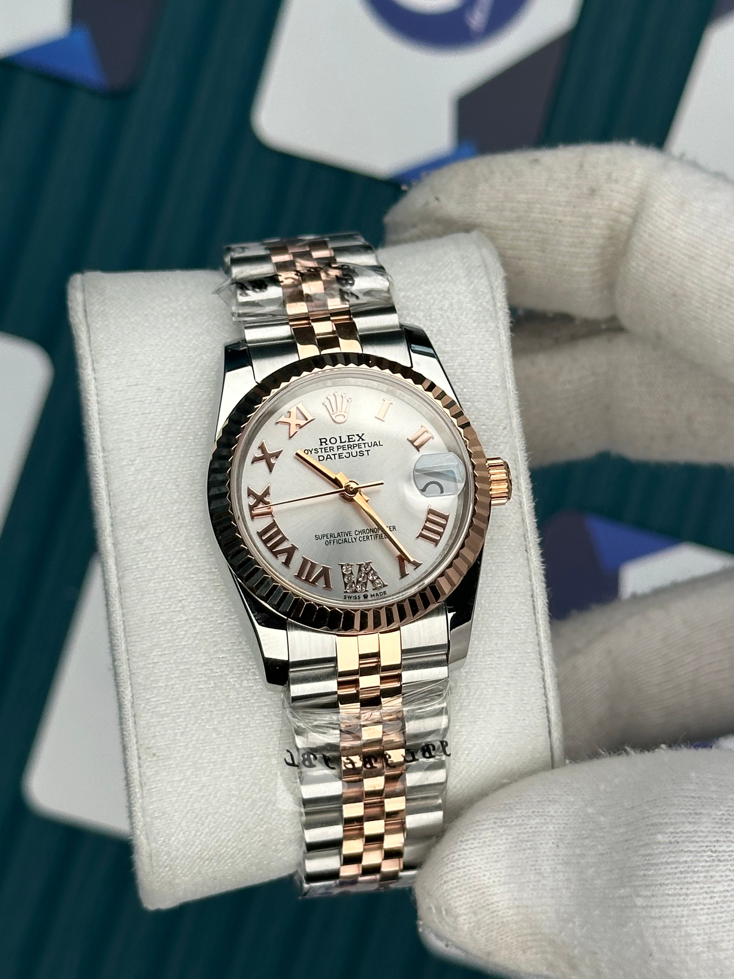 ROLEX 31 SEDEFLİ BEYAZ PIRLANTA ROMA INDEX ROSE-SILVER JUBILEE
