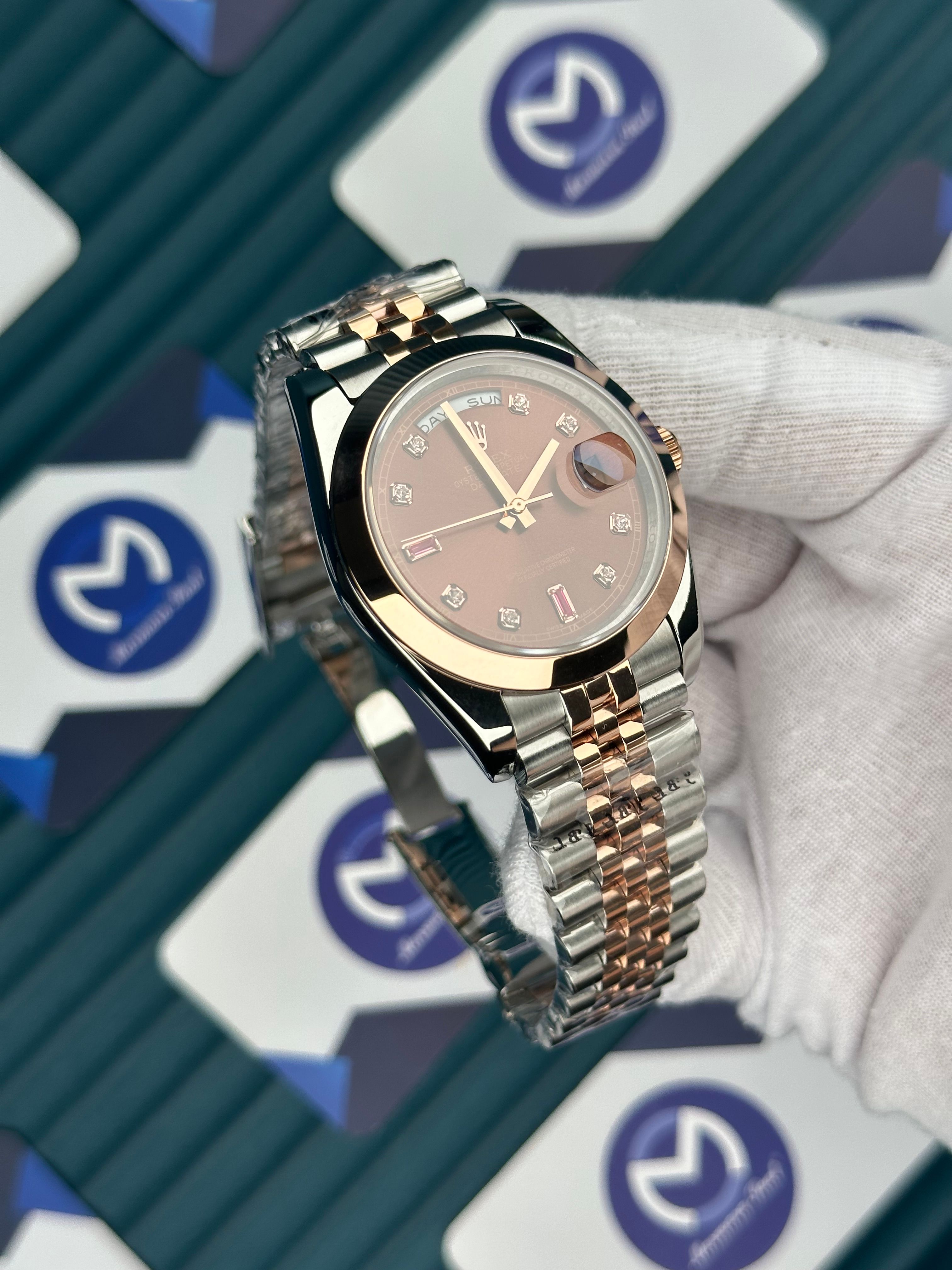 ROLEX DAY-DATE CHOCOLATE DIAL DIAMOND INDEX OVAL BEZEL ROSE-SILVER JUBILE