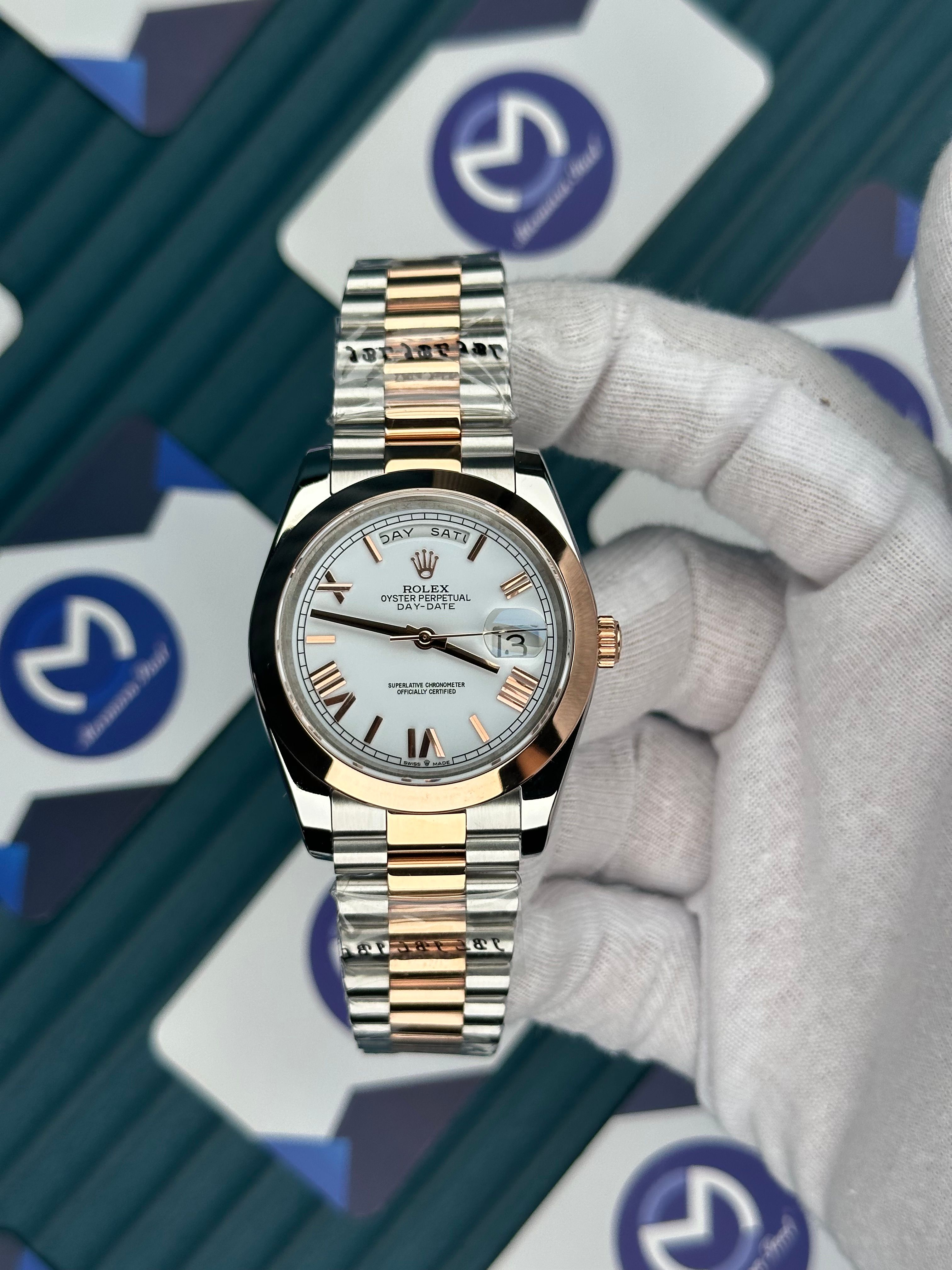 ROLEX DAY-DATE WHITE DIAL OVAL BEZEL ROMA INDEX ROSE-SILVER PRESIDENT
