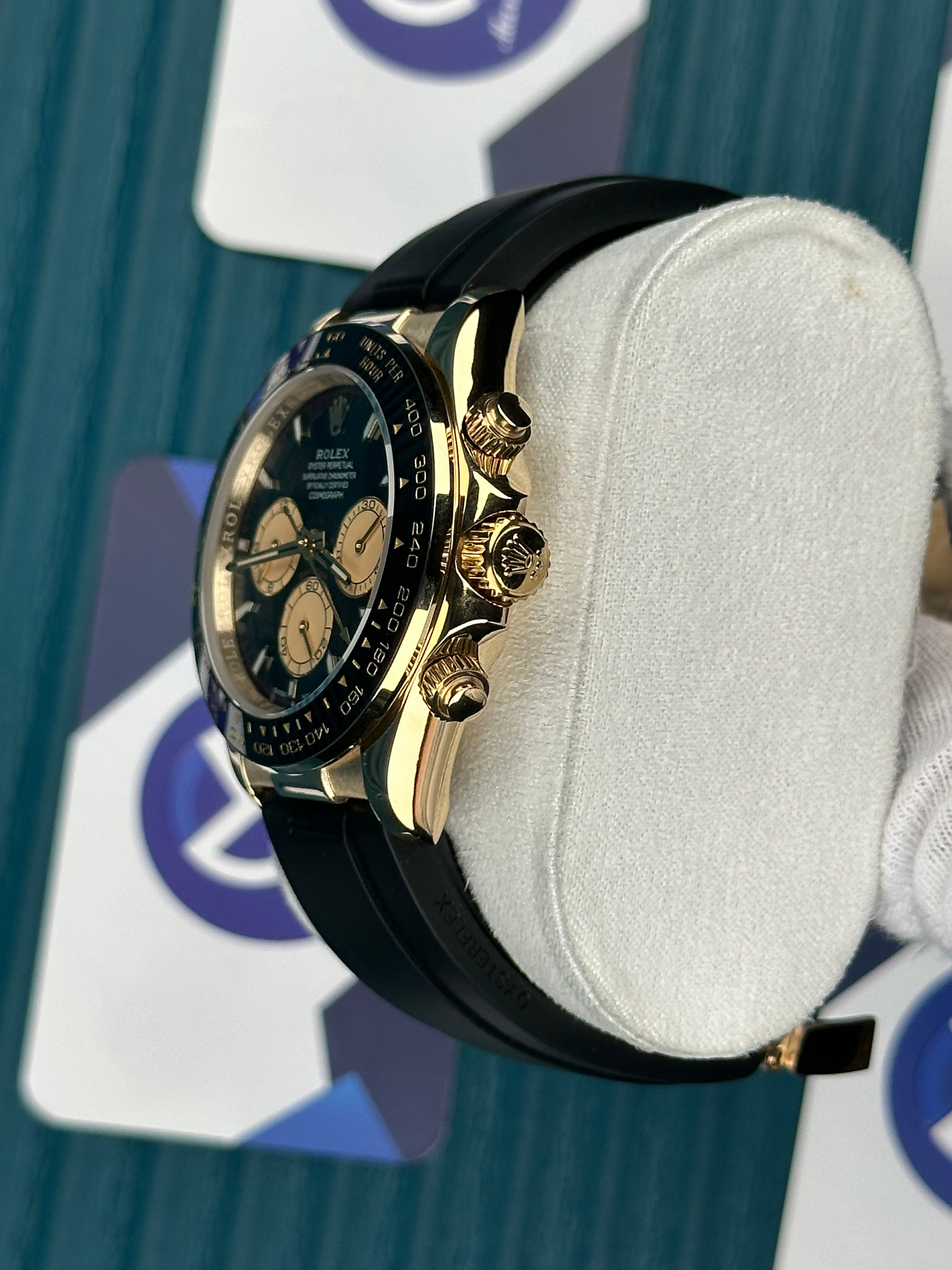 ROLEX DAYTONA BLACK DIAL GOLD CHRONOGAPH GOLD CASE OYSTERFLEX