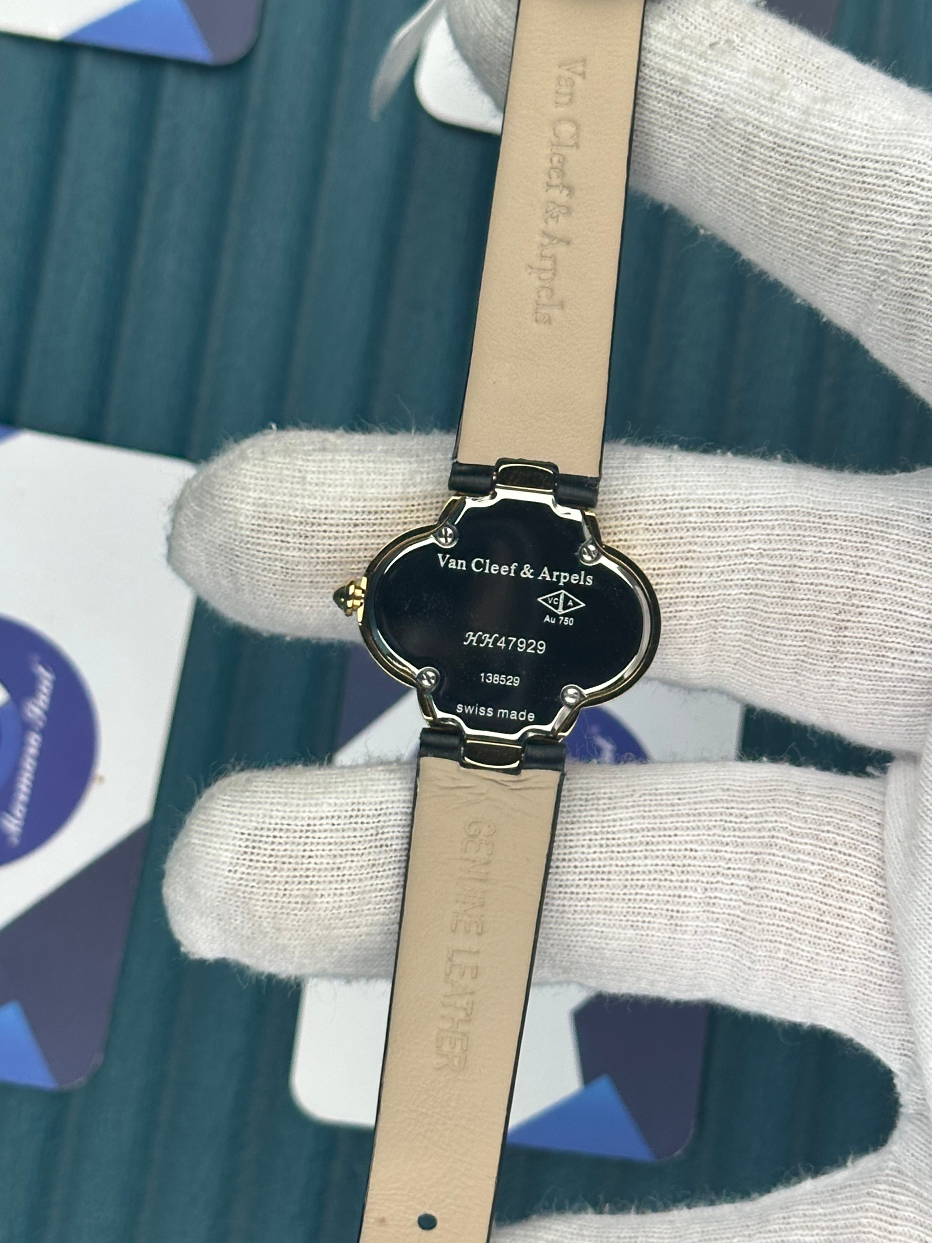 VAN CLEEF & ARPELS WHITE DIAL GOLD CASE BLACK LEATHER CORD