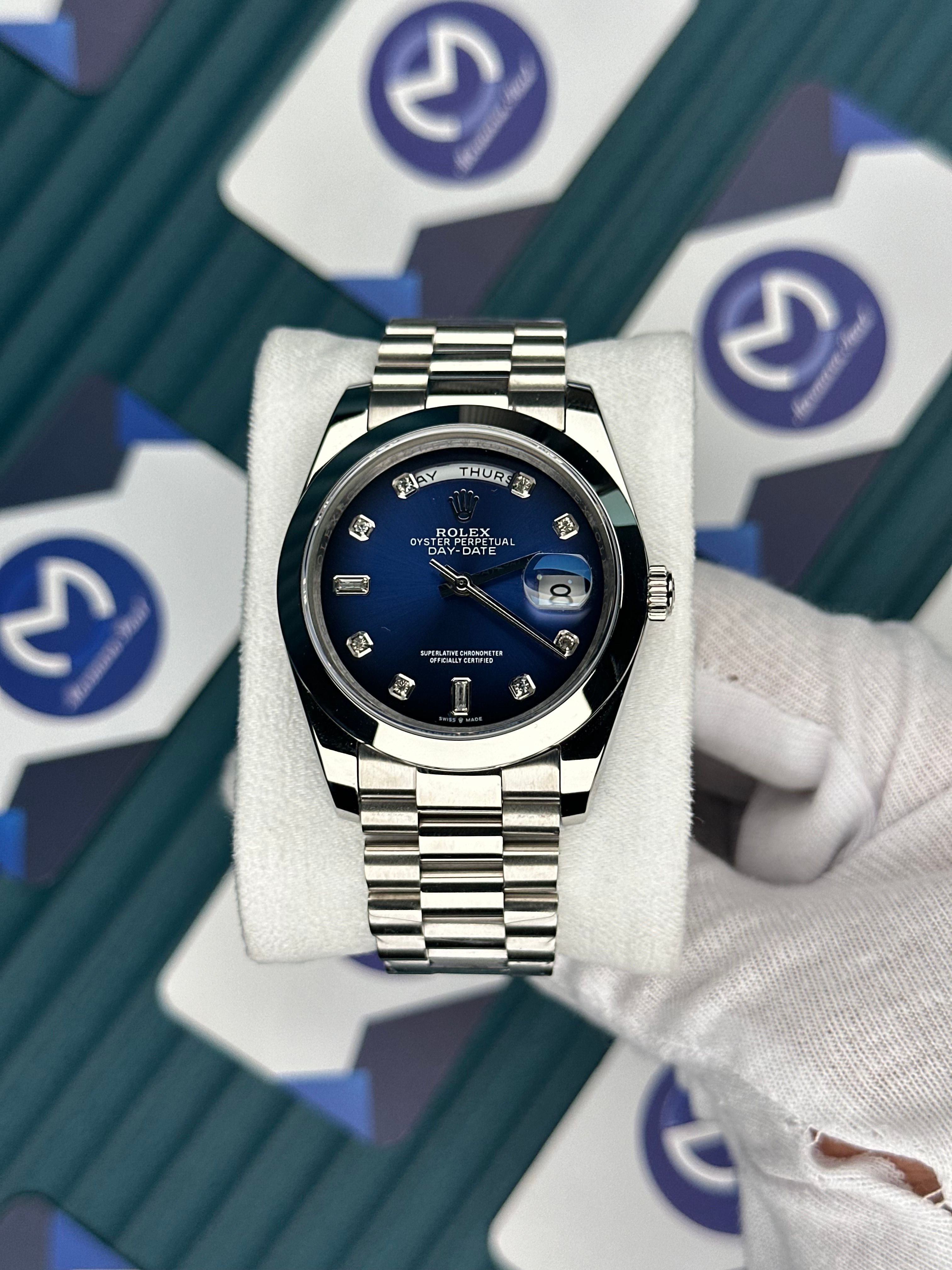 ROLEX DAY-DATE BLUE DIAL OVAL BEZEL DIAMOND INDEX SILVER PRESIDENT