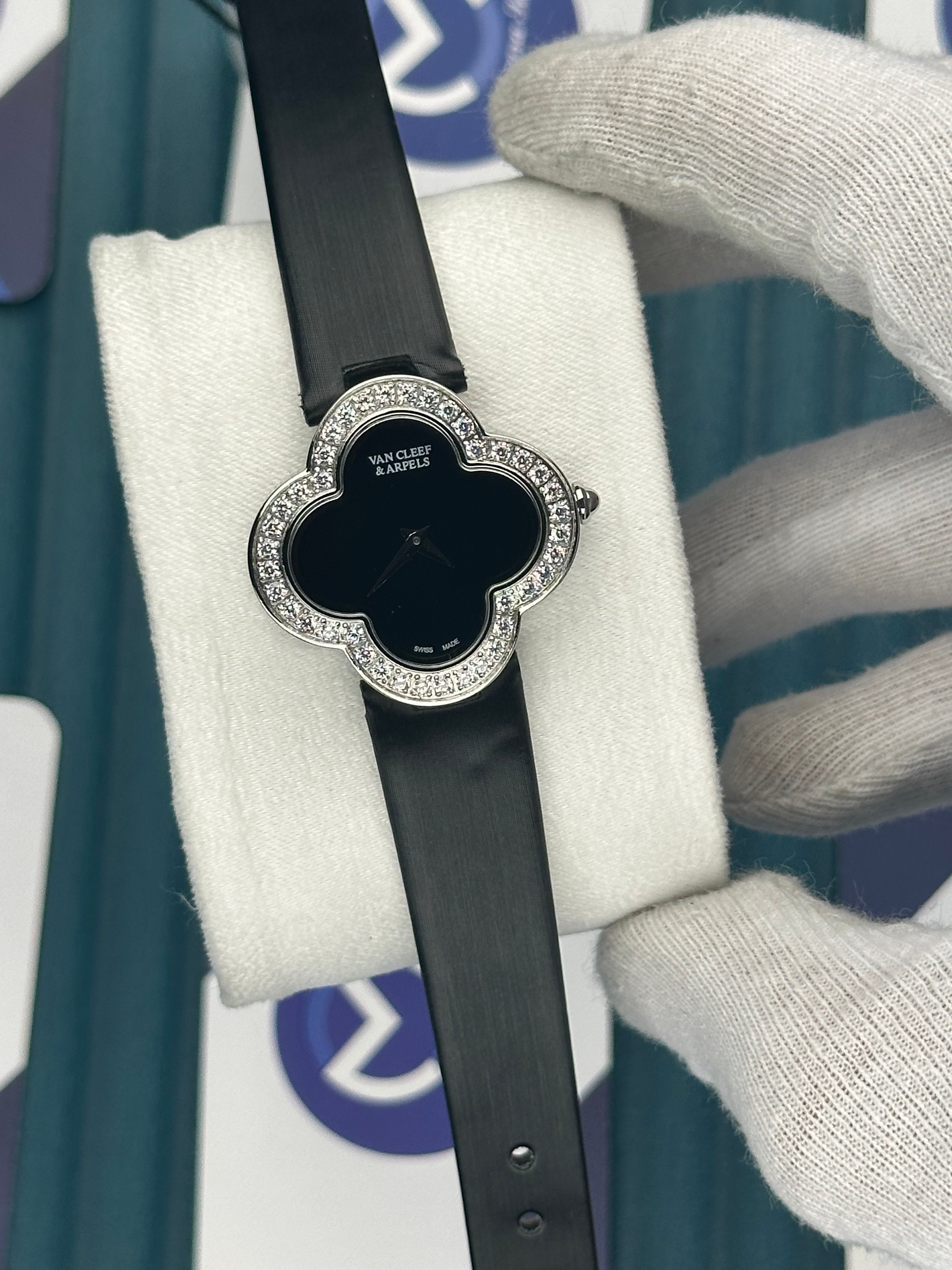 VAN CLEEF & ARPELS BLACK DIAL DIAMOND BEZEL SILVER CASE BLACK LEATHER CORD