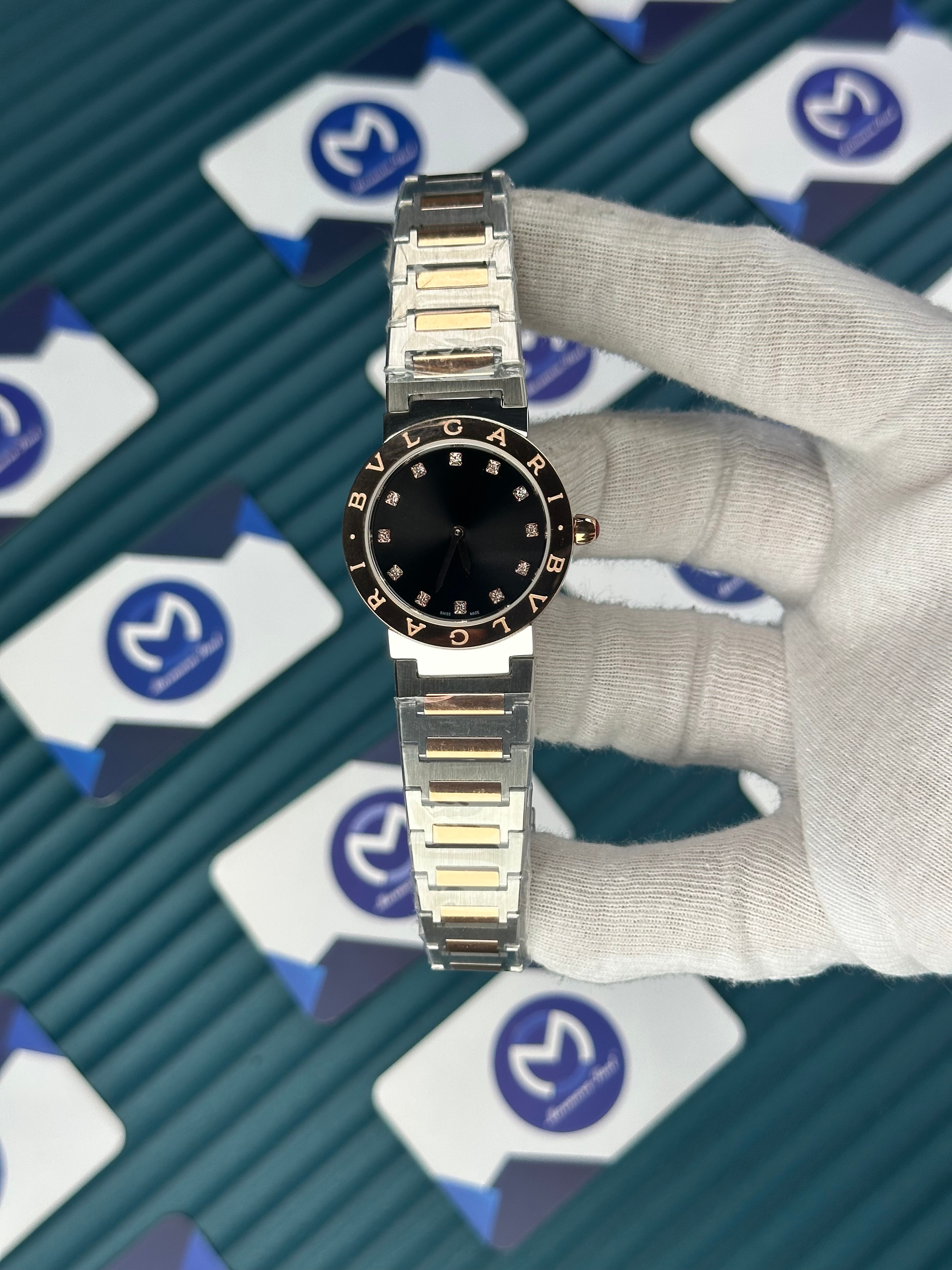 BVLGARI BLACK DIAL GOLD BEZEL DIAMOND INDEX GOLD-SILVER CORD