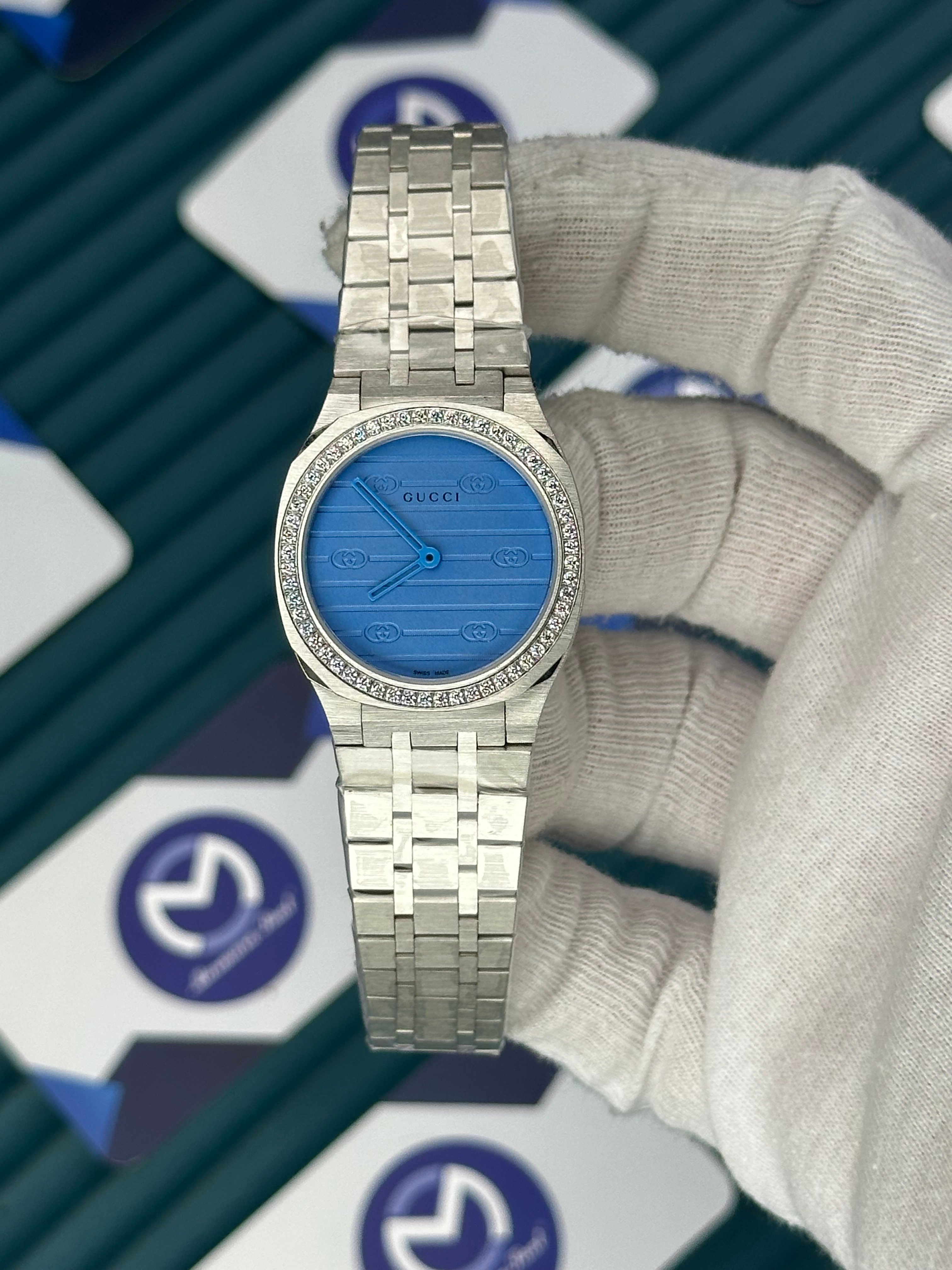 GUCCI WOMAN BLUE DIAL DIAMOND BEZEL BRUSH MARKS SILVER