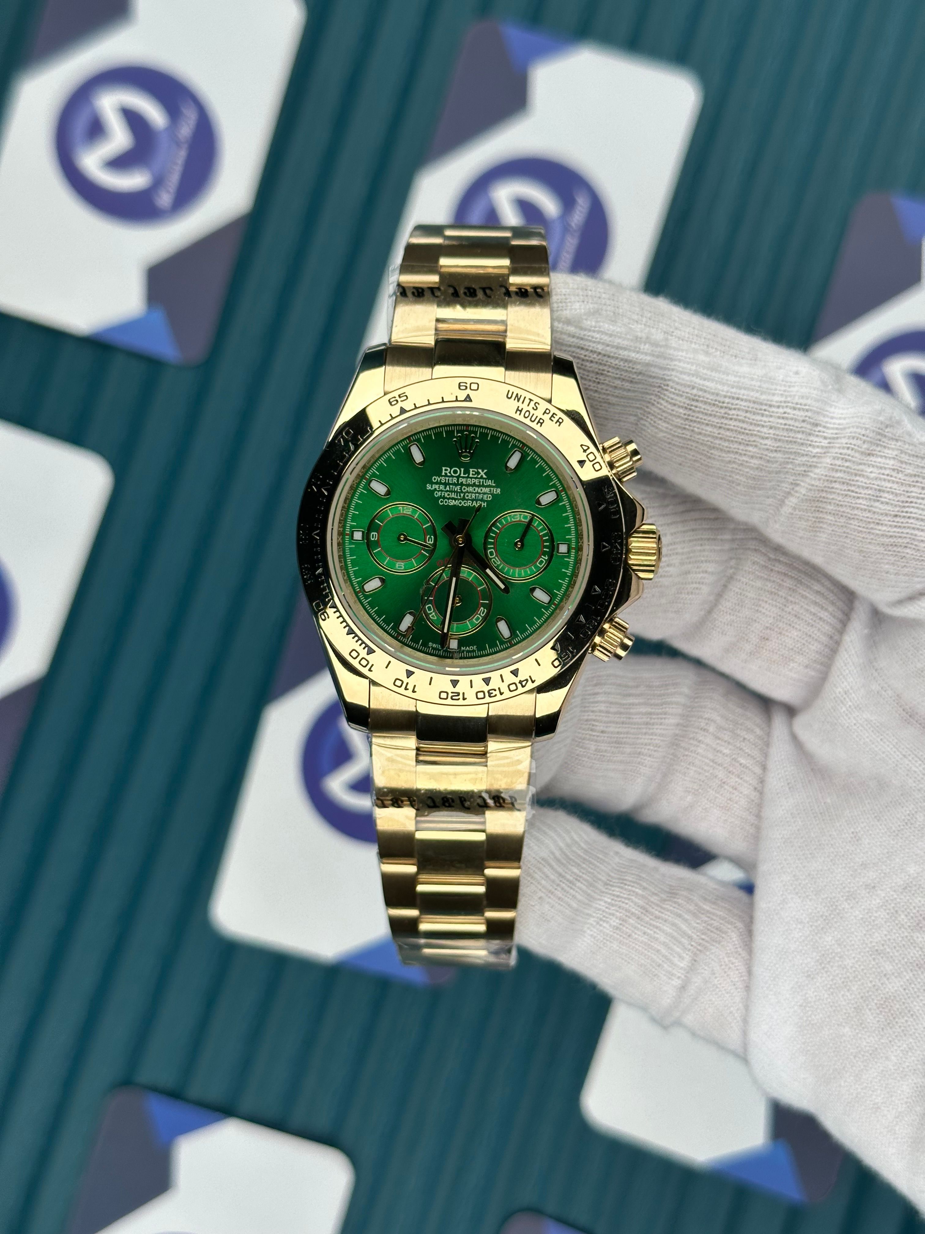 ROLEX DAYTONA GREEN DIAL GOLD OYSTER
