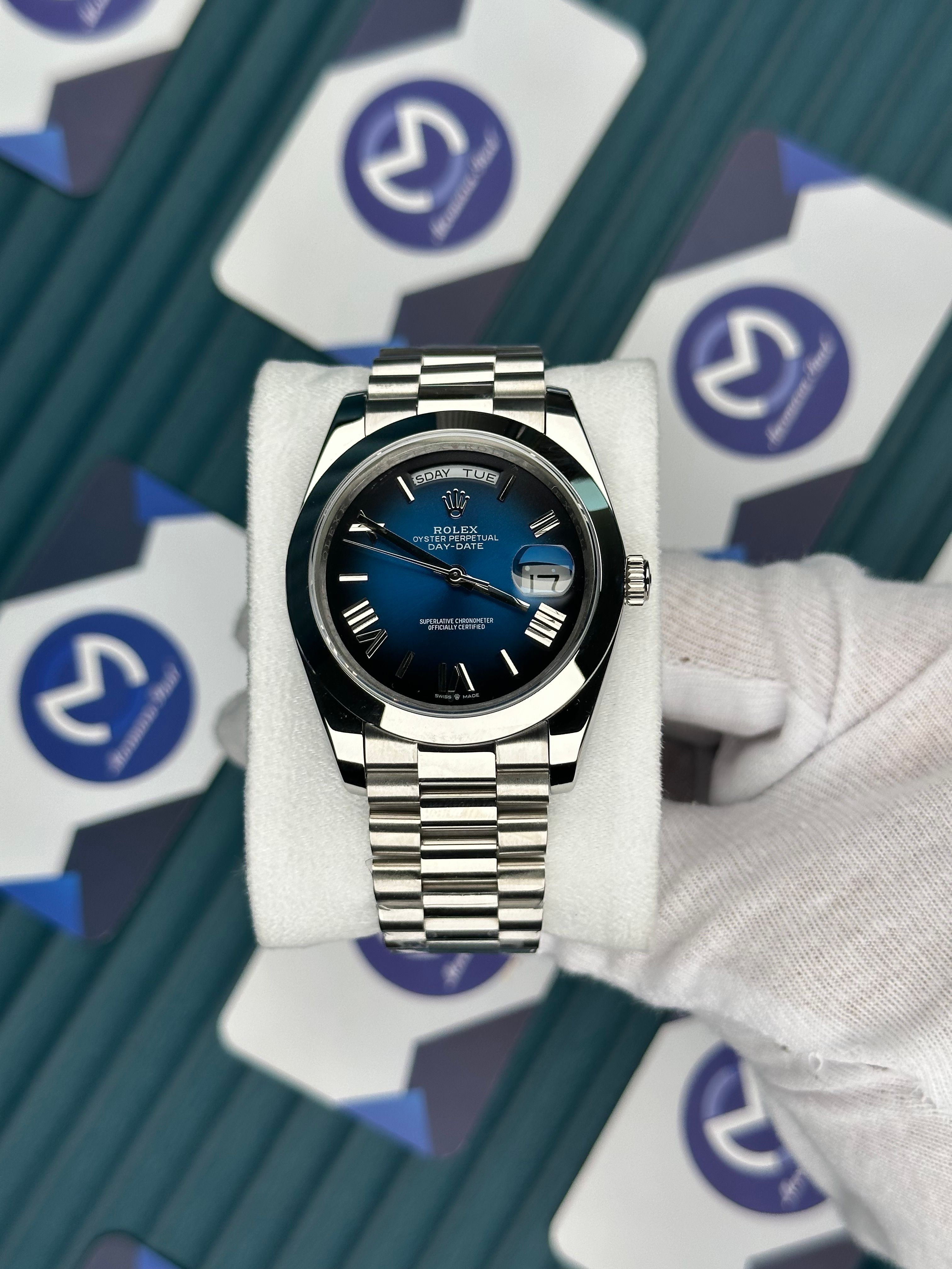 ROLEX DAY-DATE BLUE OCEAN DIAL OVAL BEZEL SILVER PRESIDENT