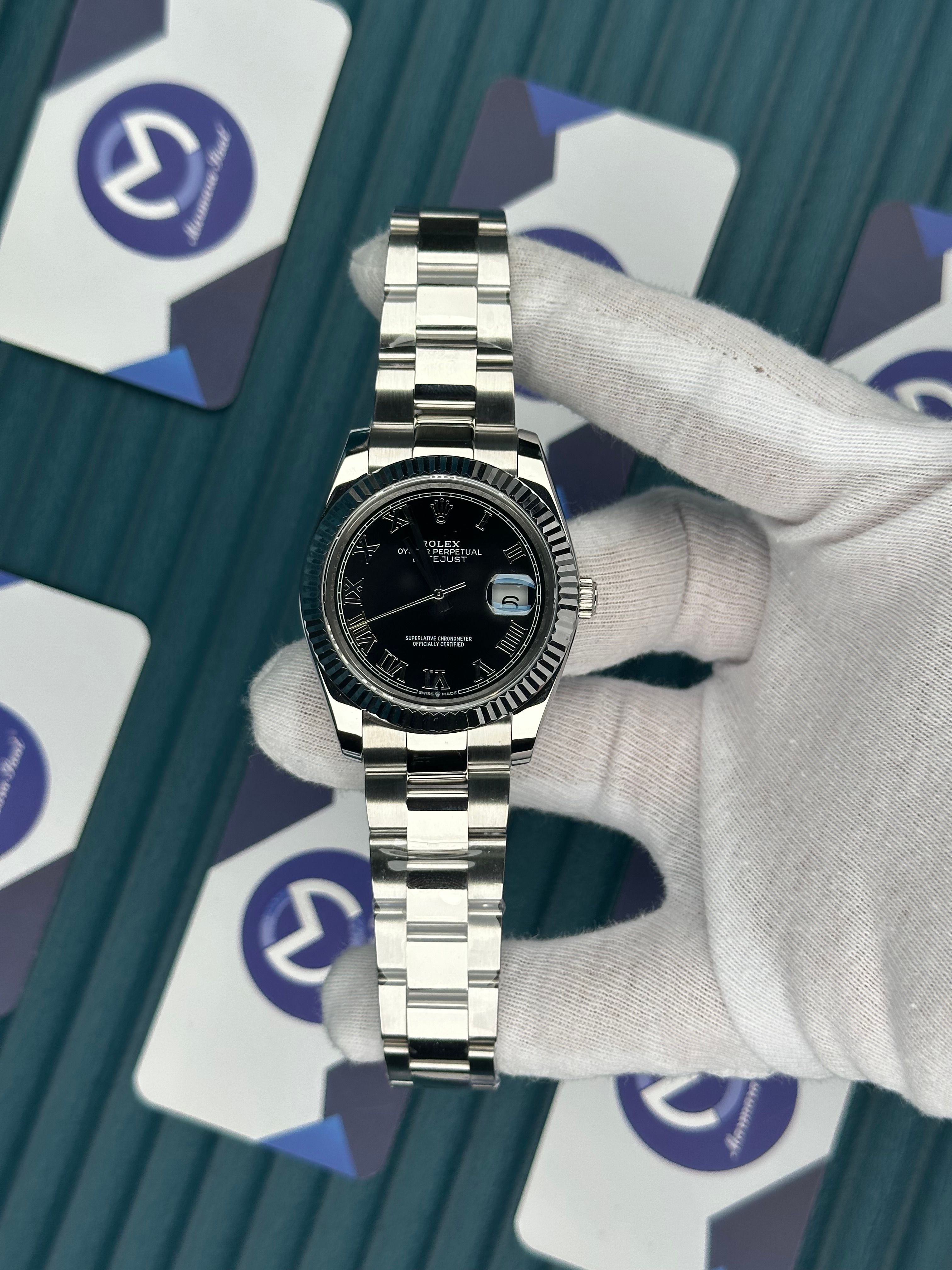 ROLEX DATEJUST BLACK DIAL ROMA INDEX SILVER OYSTER