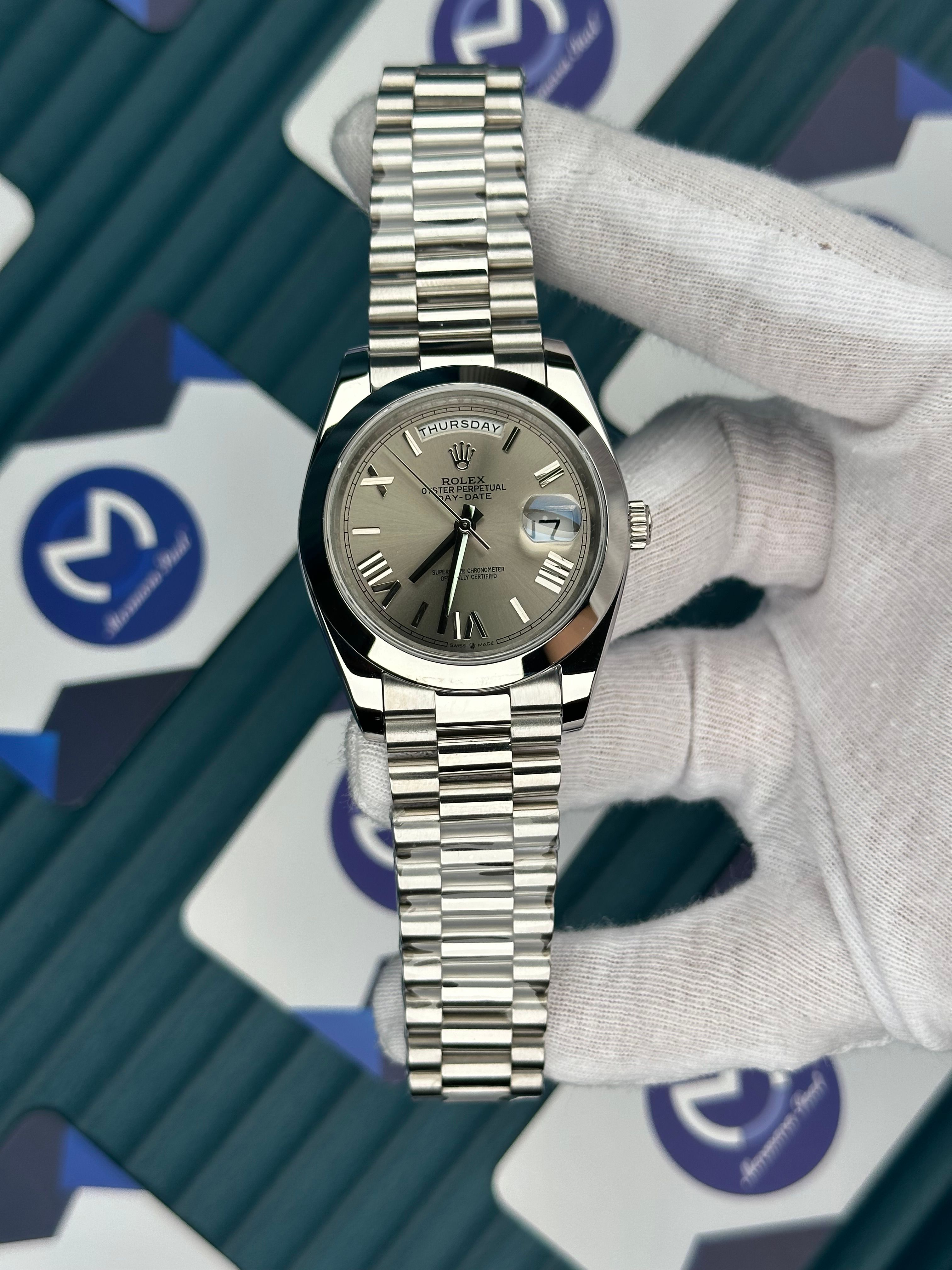 ROLEX DAY-DATE GREY DIAL OVAL BEZEL ROMA INDEX SILVER PRESIDENT