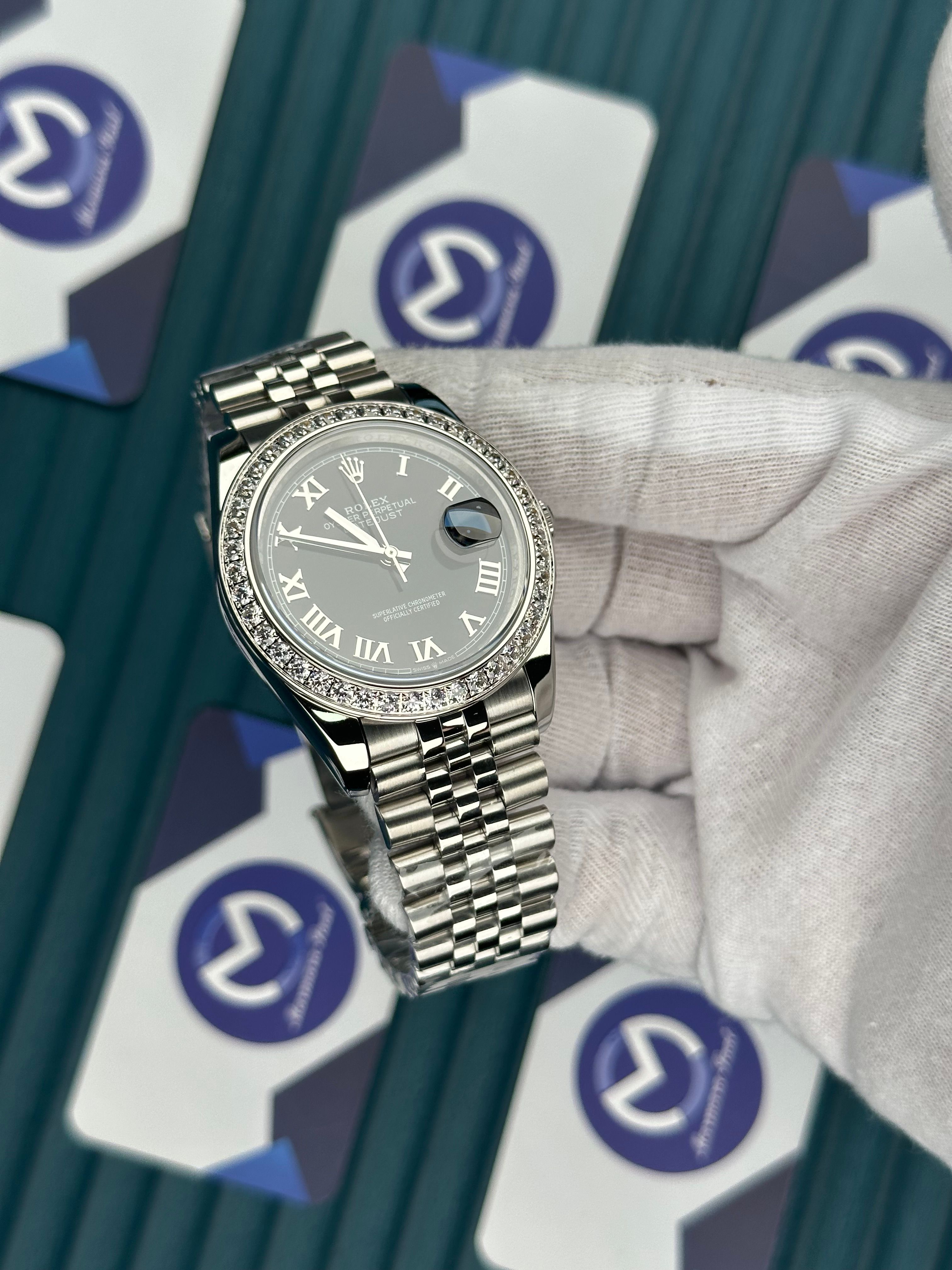ROLEX DATEJUST BLACK DIAL DIAMOND BEZELROMA INDEX SILVER JUBILE