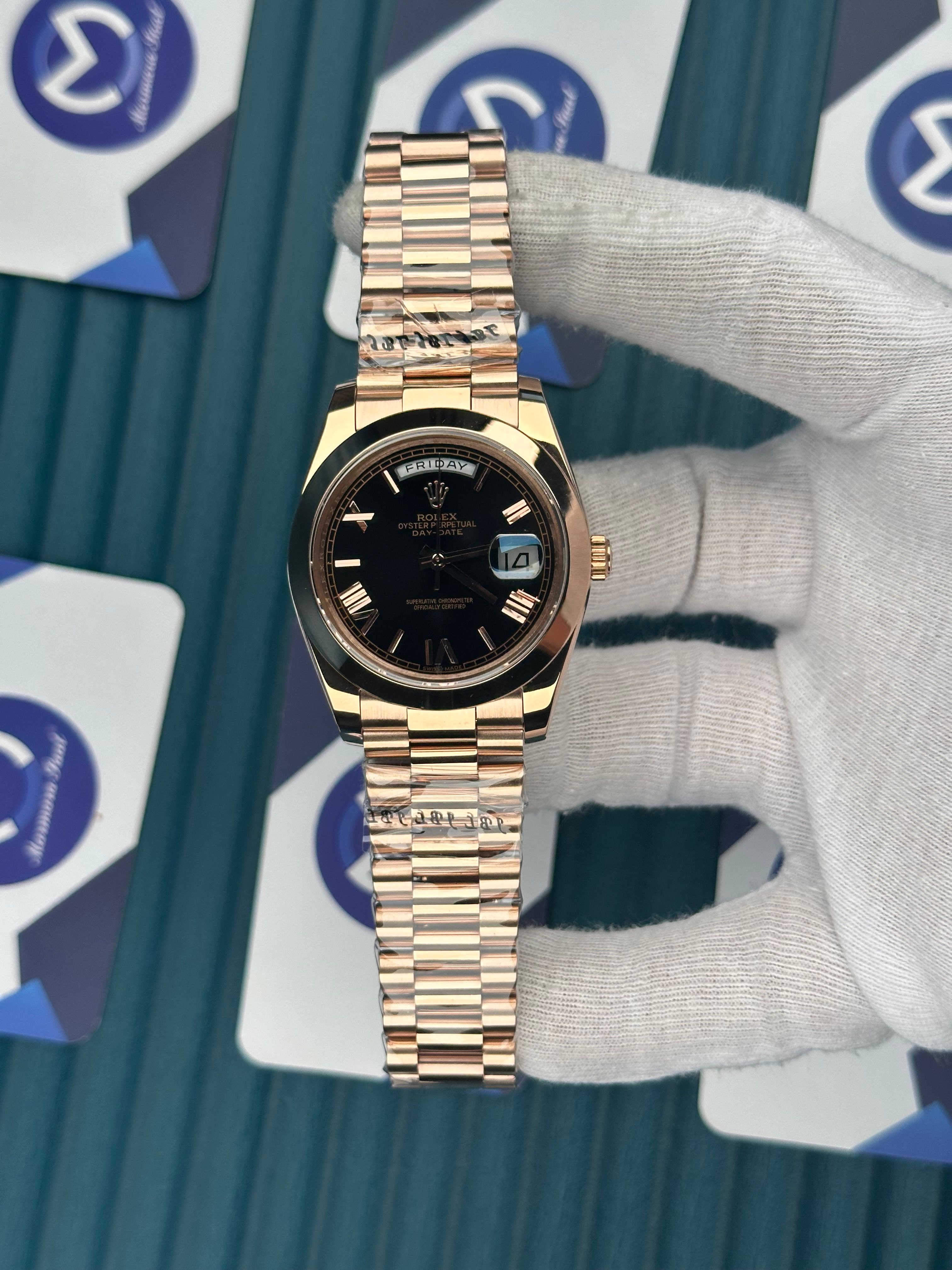 ROLEX DAY-DATE BLACK DIAL OVAL BEZEL ROSE PRESIDENT