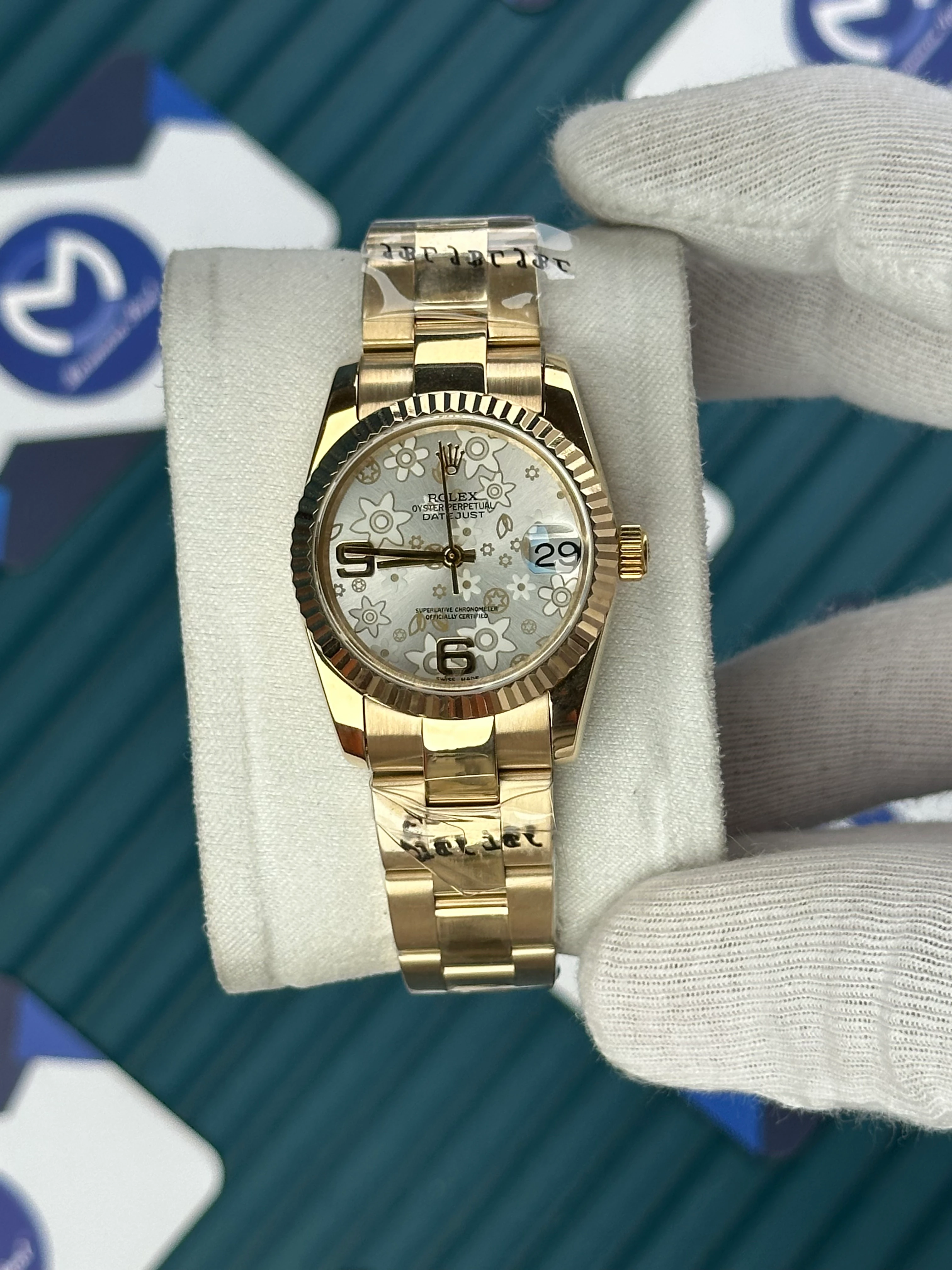 ROLEX 31 MM DATEJUST WHITE FLOWERS PATTERNED DIAL GOLD OYSTER 