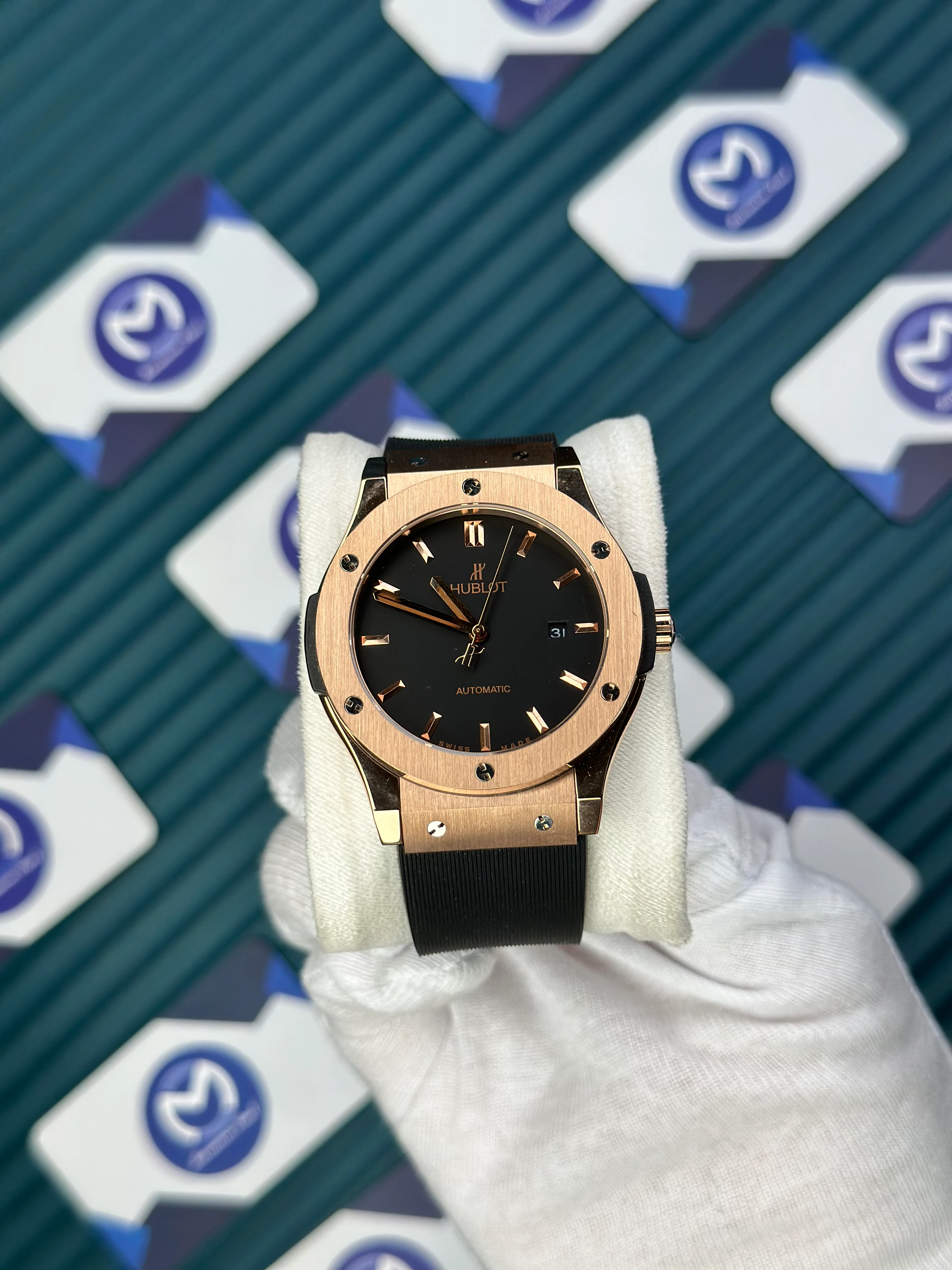 HUBLOT GENEVE AUTOMATIC VENDOME BLACK DIAL ROSE BEZEL BLACK CASE BLACK RUBBER CORD 