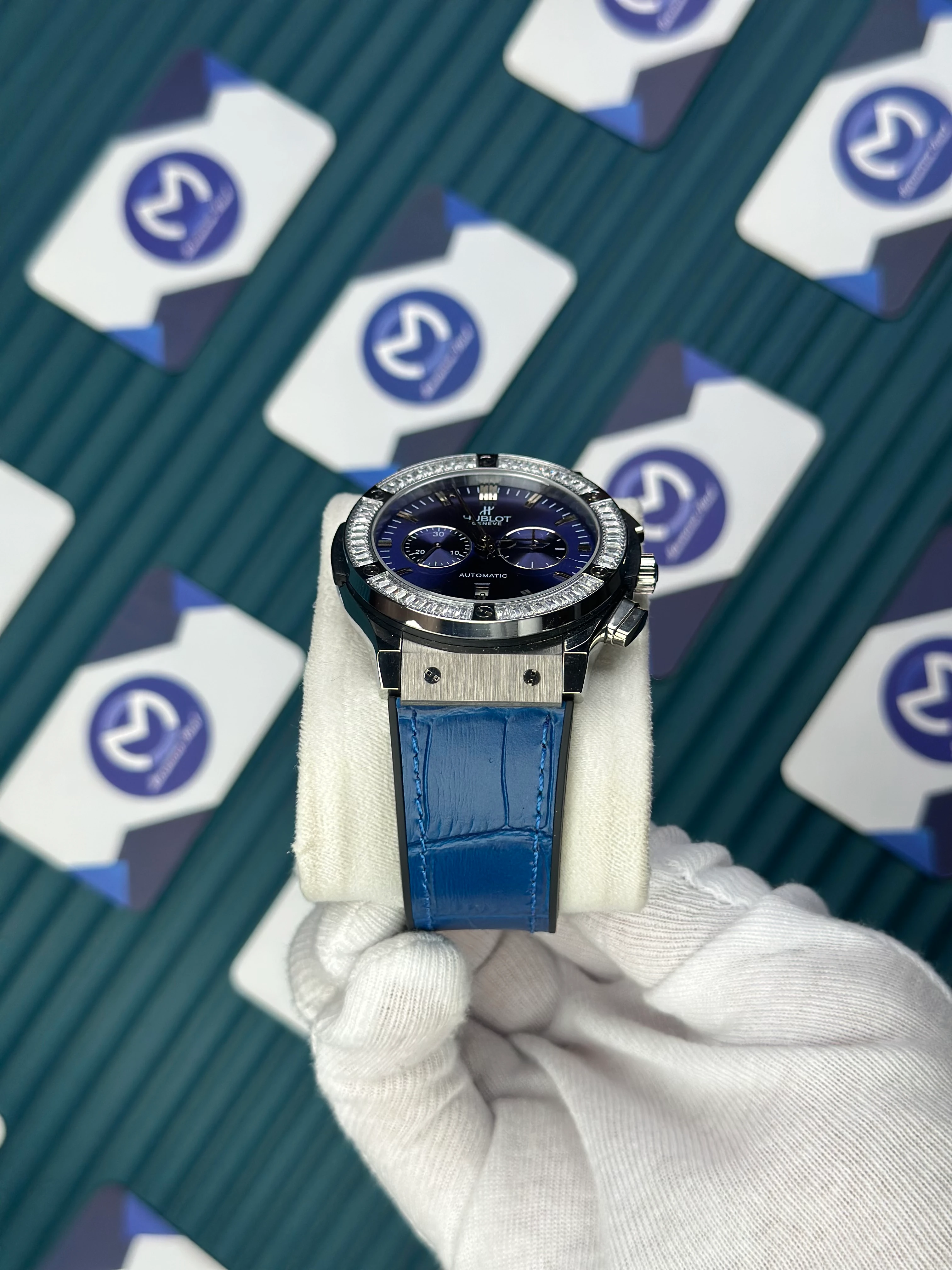 HUBLOT AUTOMATIC BLUE CHRONOGRAPH DIAL DIAMOND BEZEL SILVER CASE BLUE LEATHER CORD 