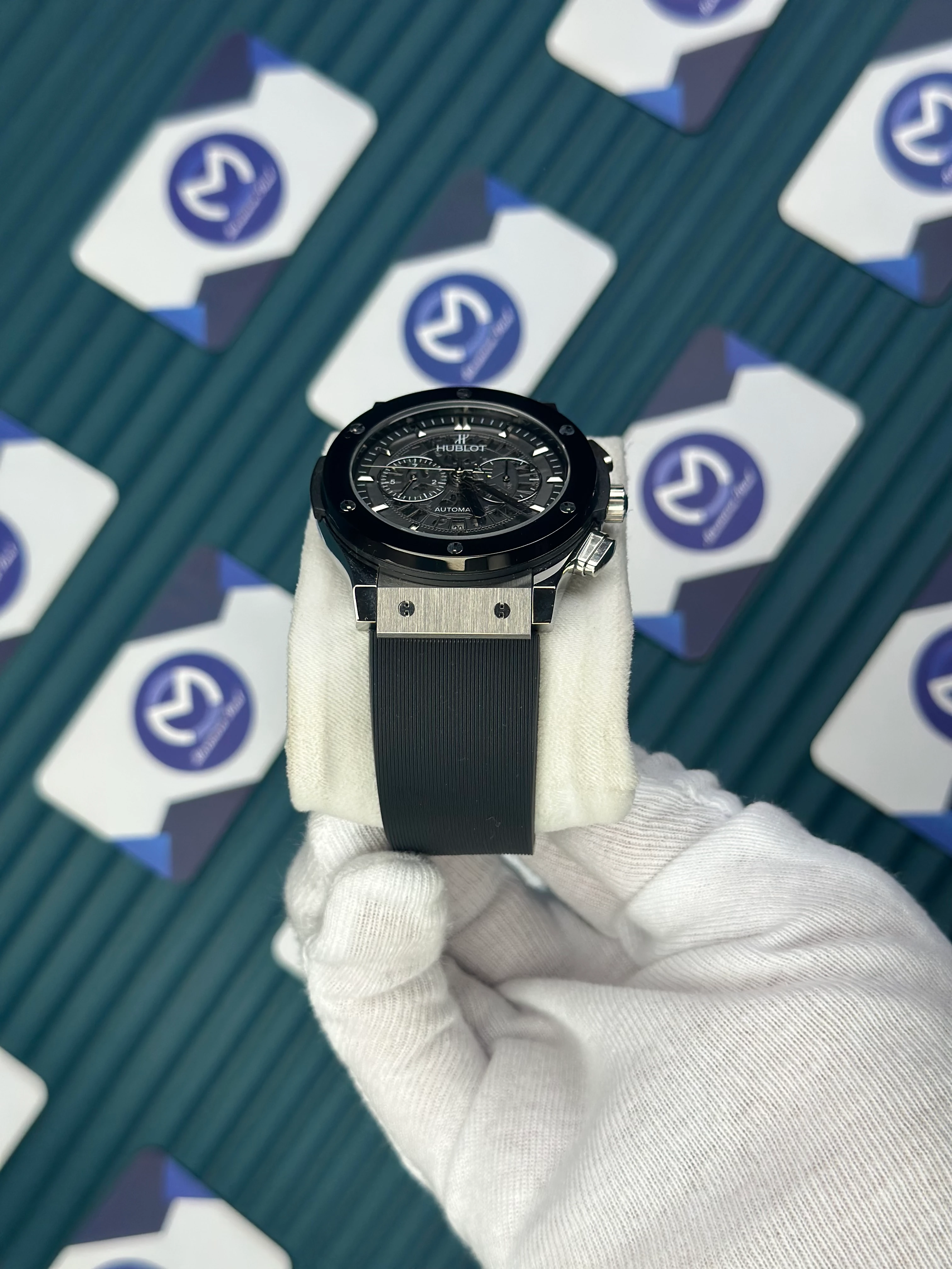 HUBLOT AUTOMATIC CHRONOGRAP SKELETON BLACK BEZEL SILVER CASE BLACK RUBBER CORD 