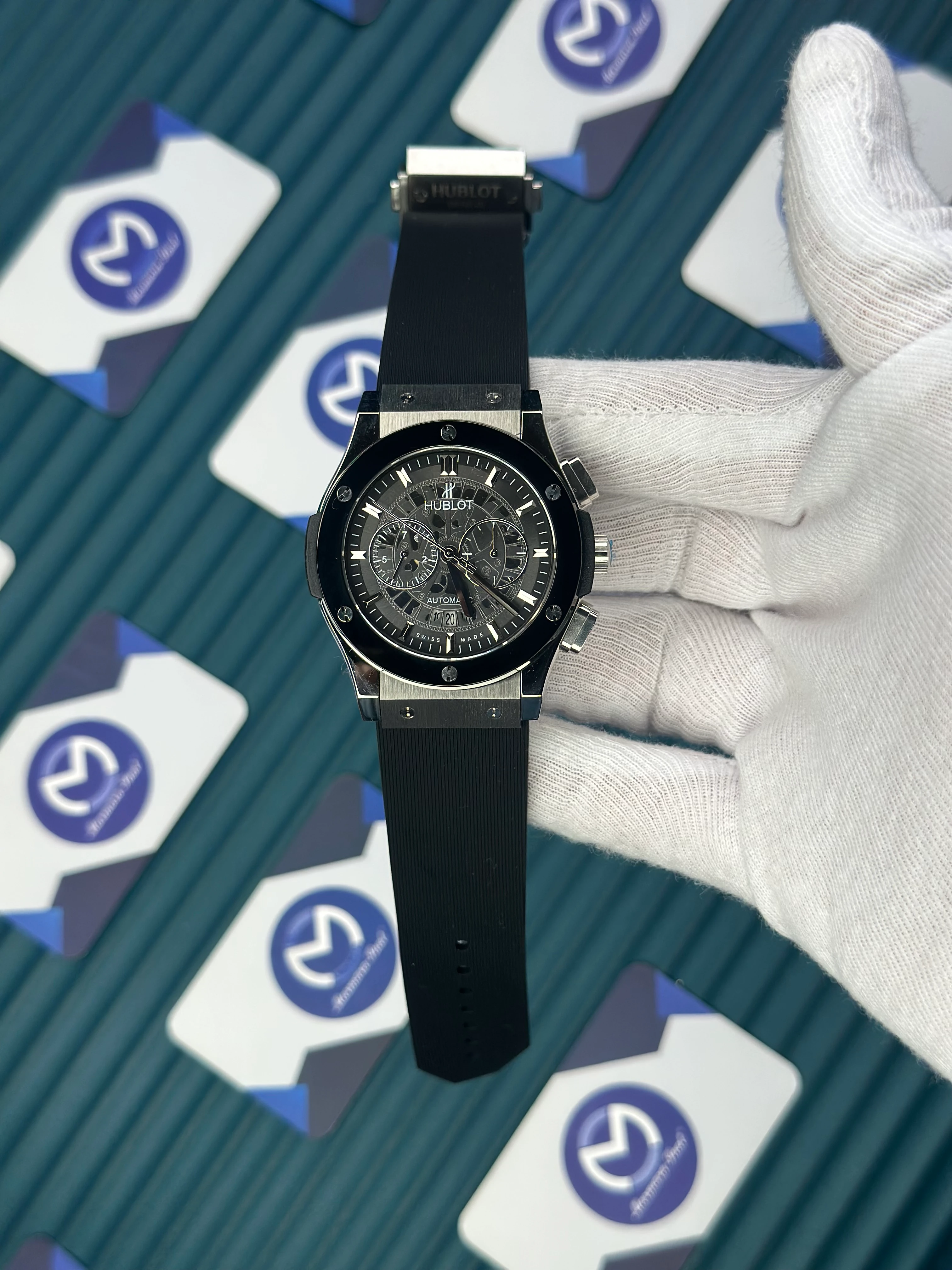 HUBLOT AUTOMATIC CHRONOGRAP SKELETON BLACK BEZEL SILVER CASE BLACK RUBBER CORD 