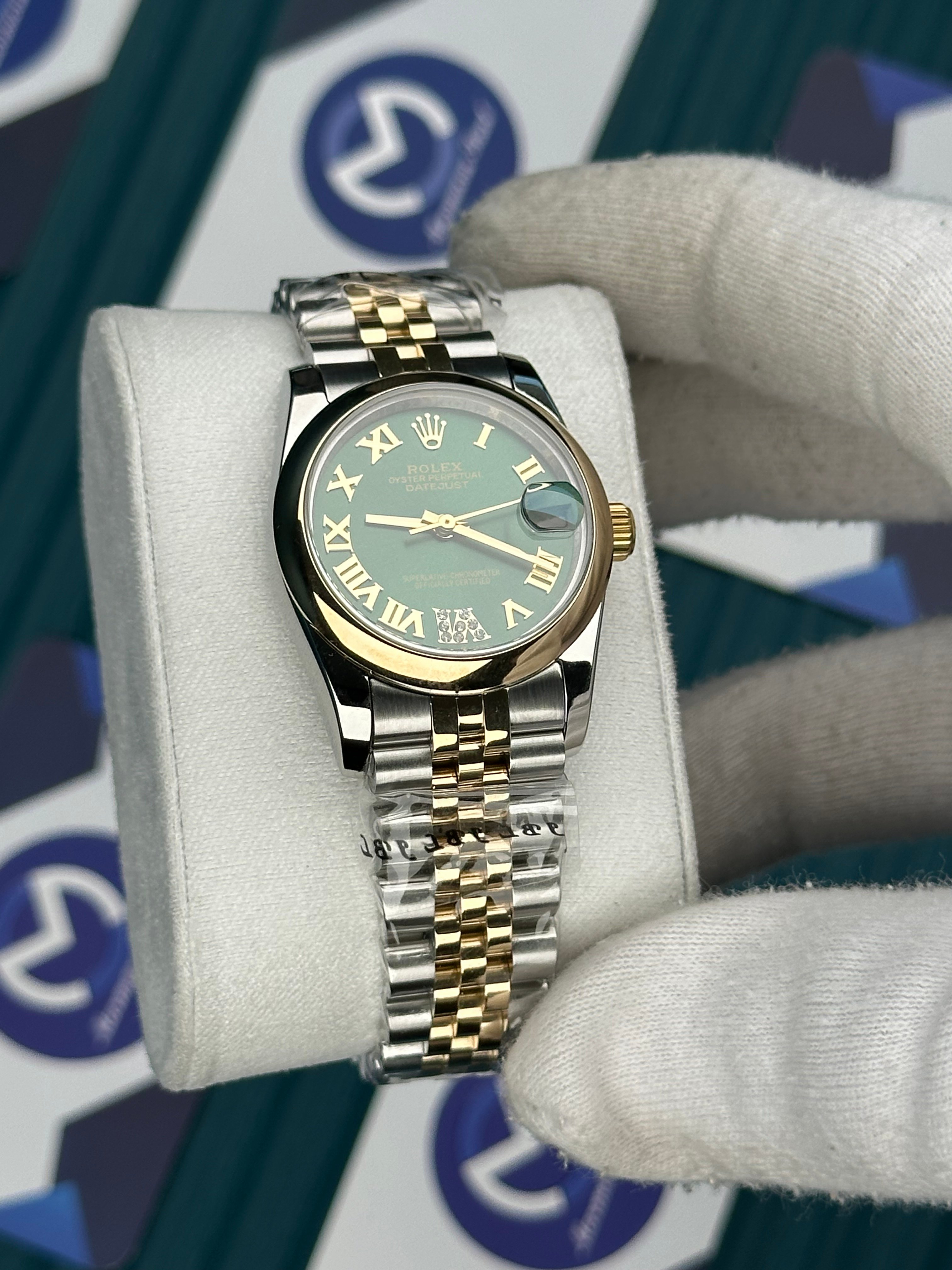 ROLEX 31 OVAL BEZEL GREEN DIAL GOLD-SILVER JUBILEE