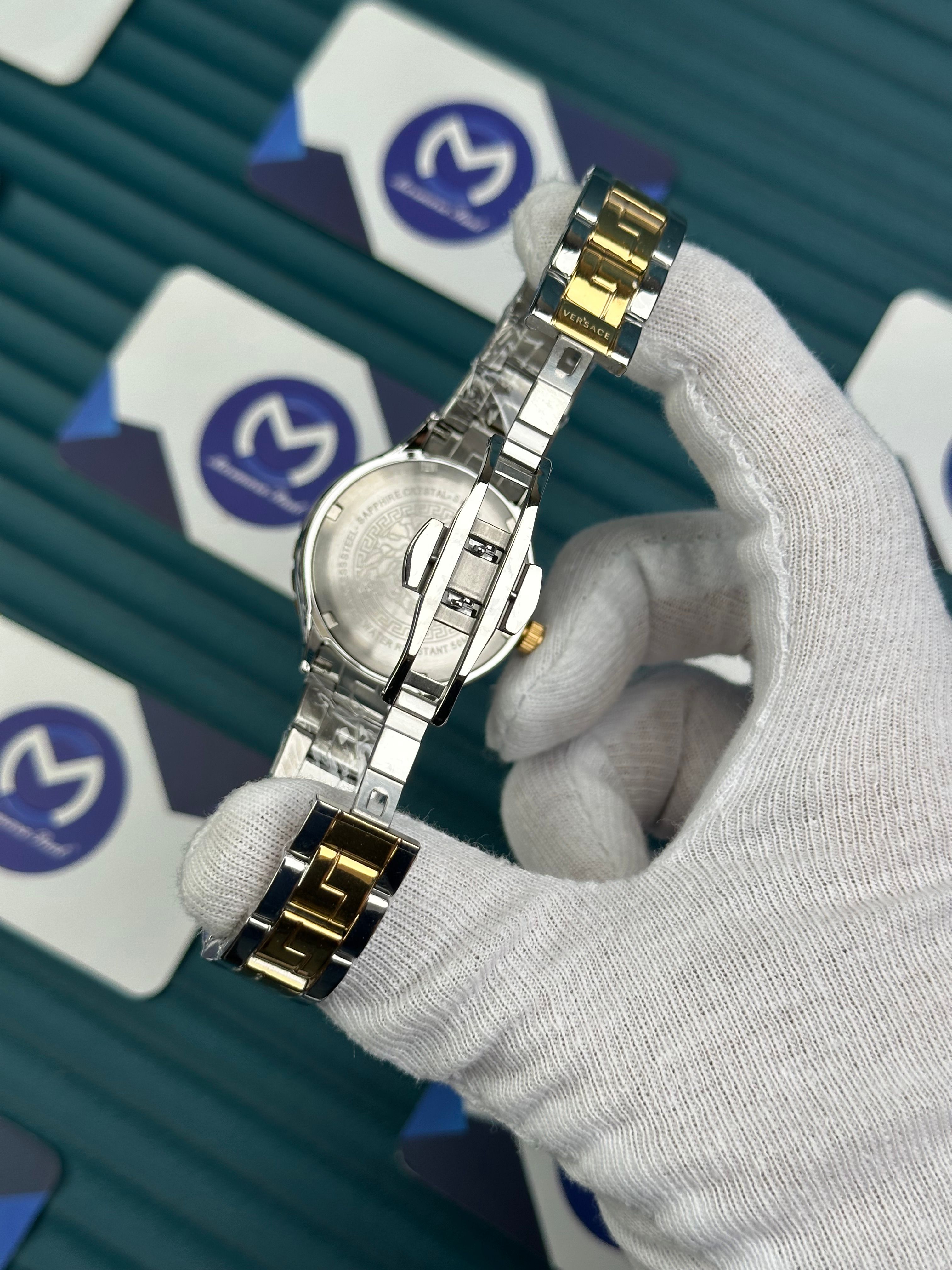 VERSACE 36 BLACK DIAL GOLD-SILVER CORD 
