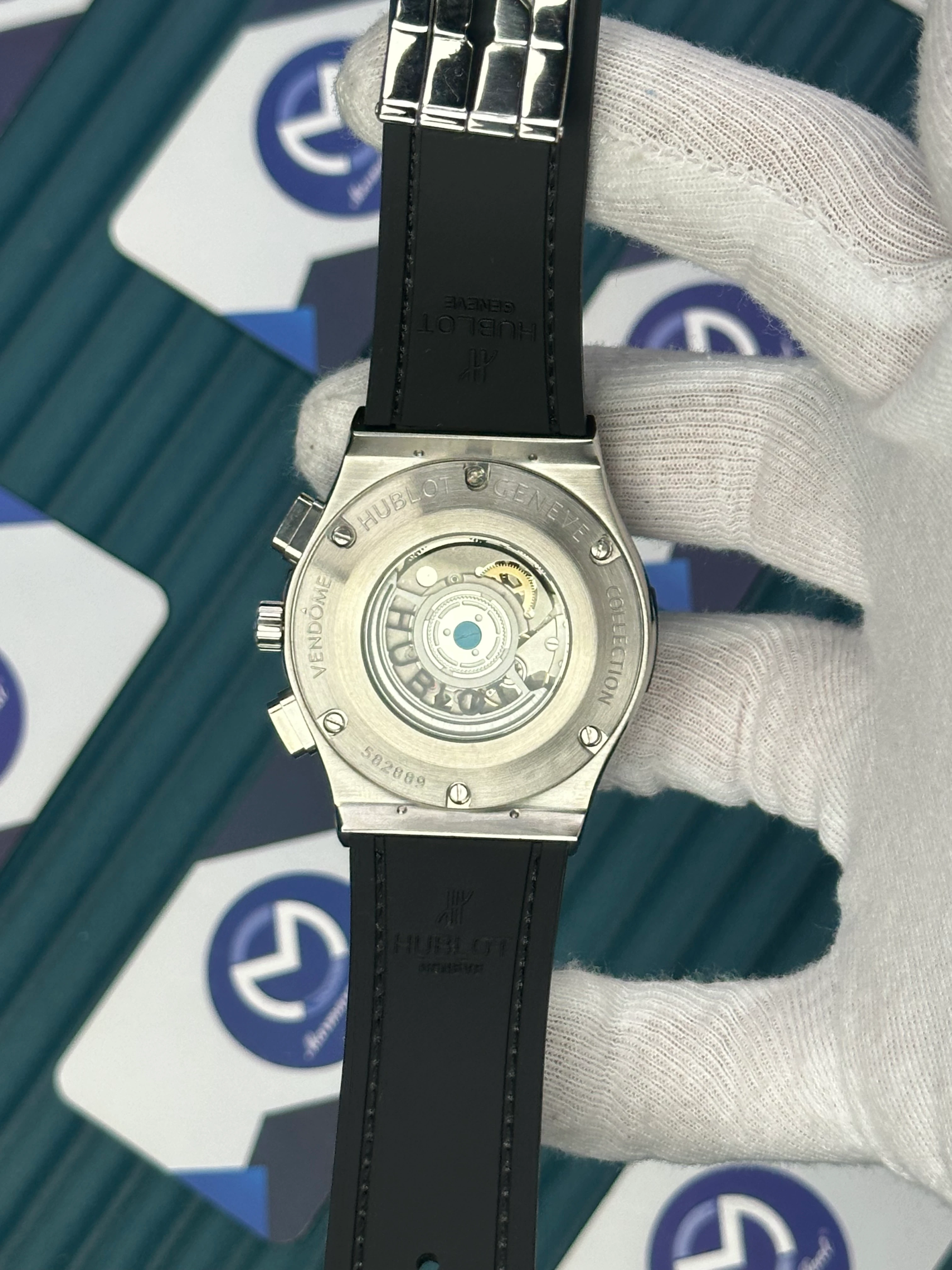 HUBLOT AUTOMATIC BLUE CHRONOGRAPH DIAL DIAMOND BEZEL SILVER CASE BLUE LEATHER CORD 