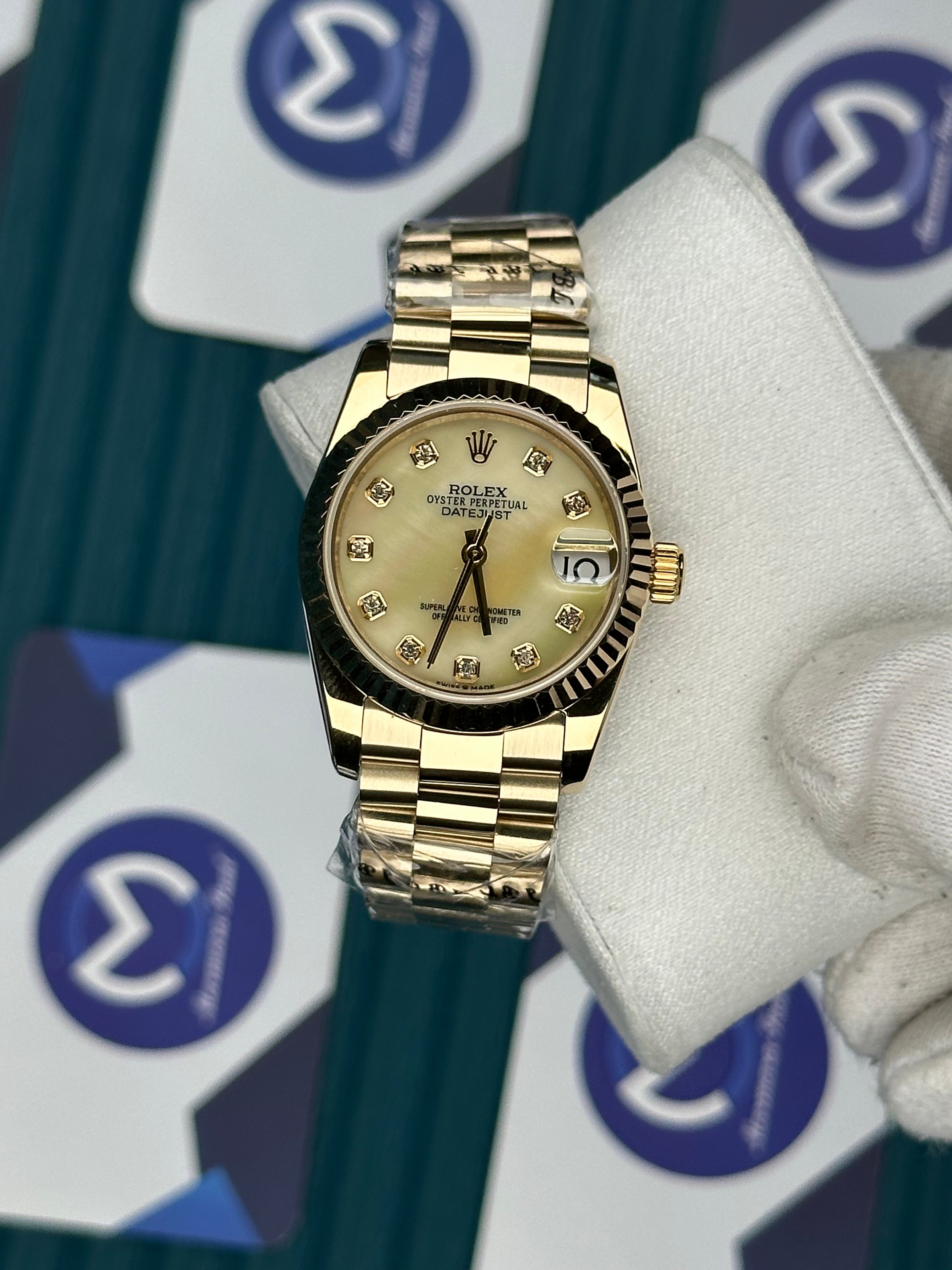 ROLEX 31 CHAMPAGNE DIAL GOLD PRESIDENT