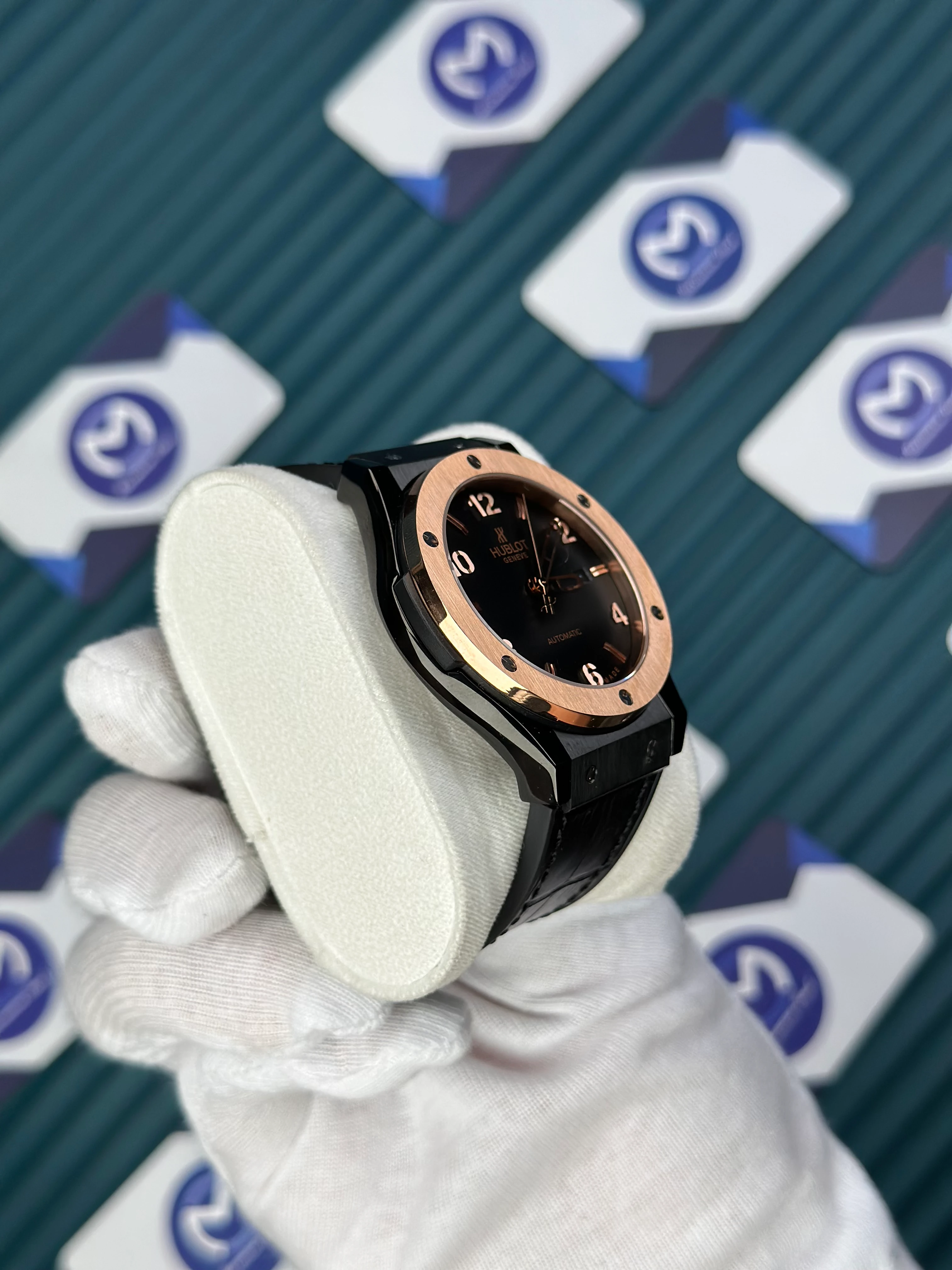 HUBLOT GENEVE AUTOMATIC VENDOME BLACK DIAL ROSE BEZEL BLACK CASE BLACK LEATHER CORD