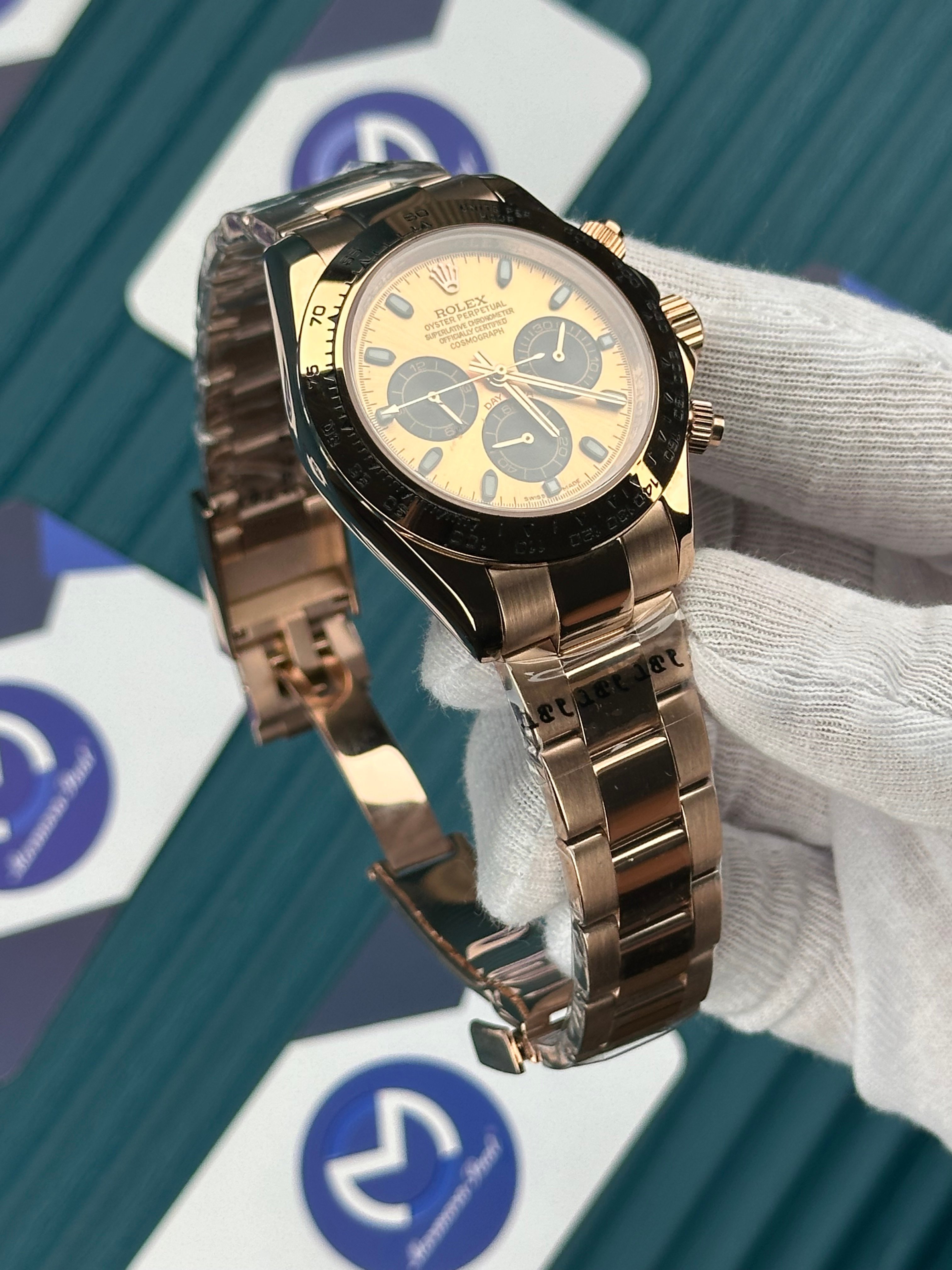ROLEX DAYTONA CHAMPAGNE DIAL ROSE OYSTER