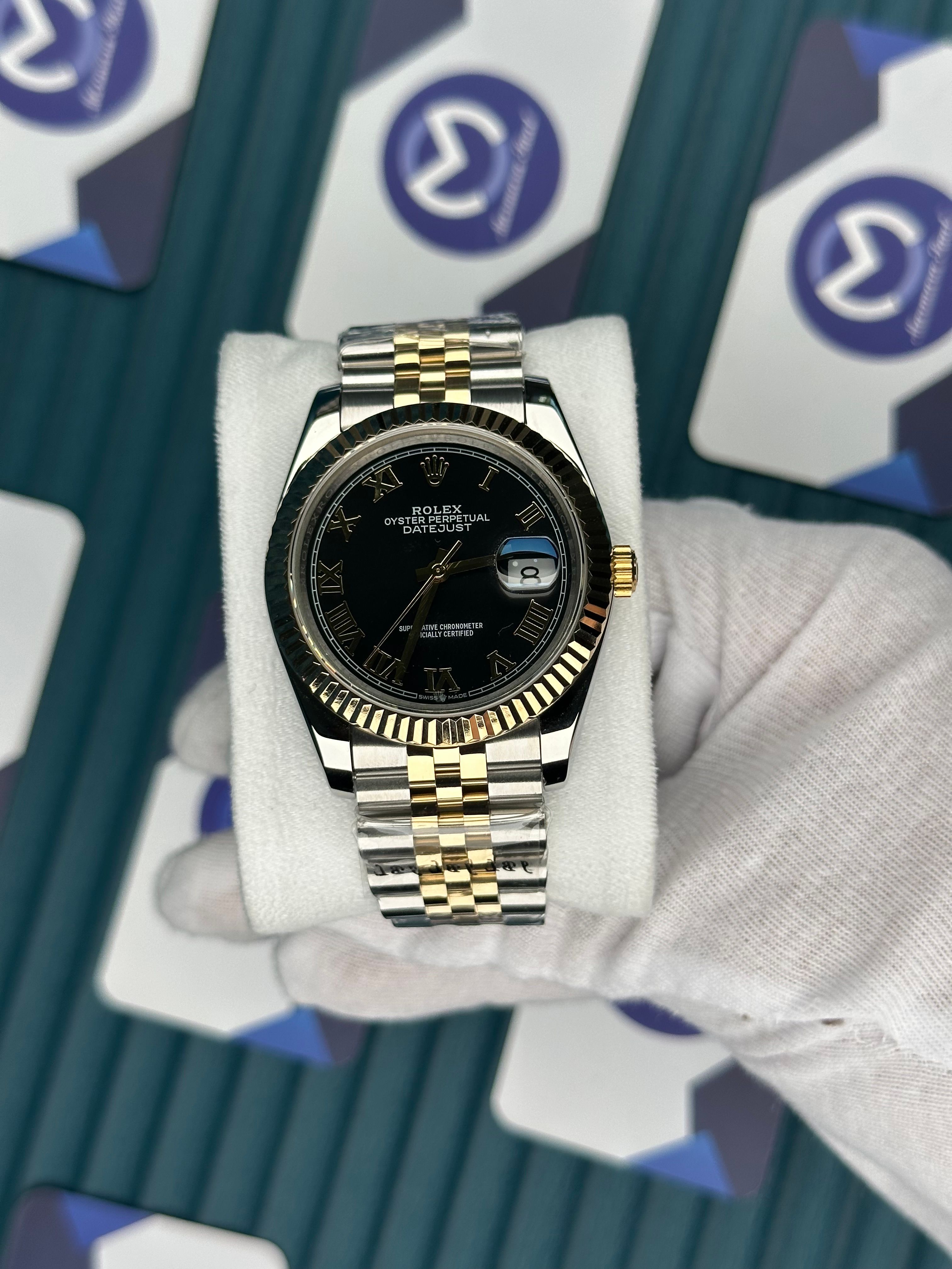 ROLEX DATEJUST GOLD ROMA INDEX BLACK DIAL GOLD-SILVER JUBILE