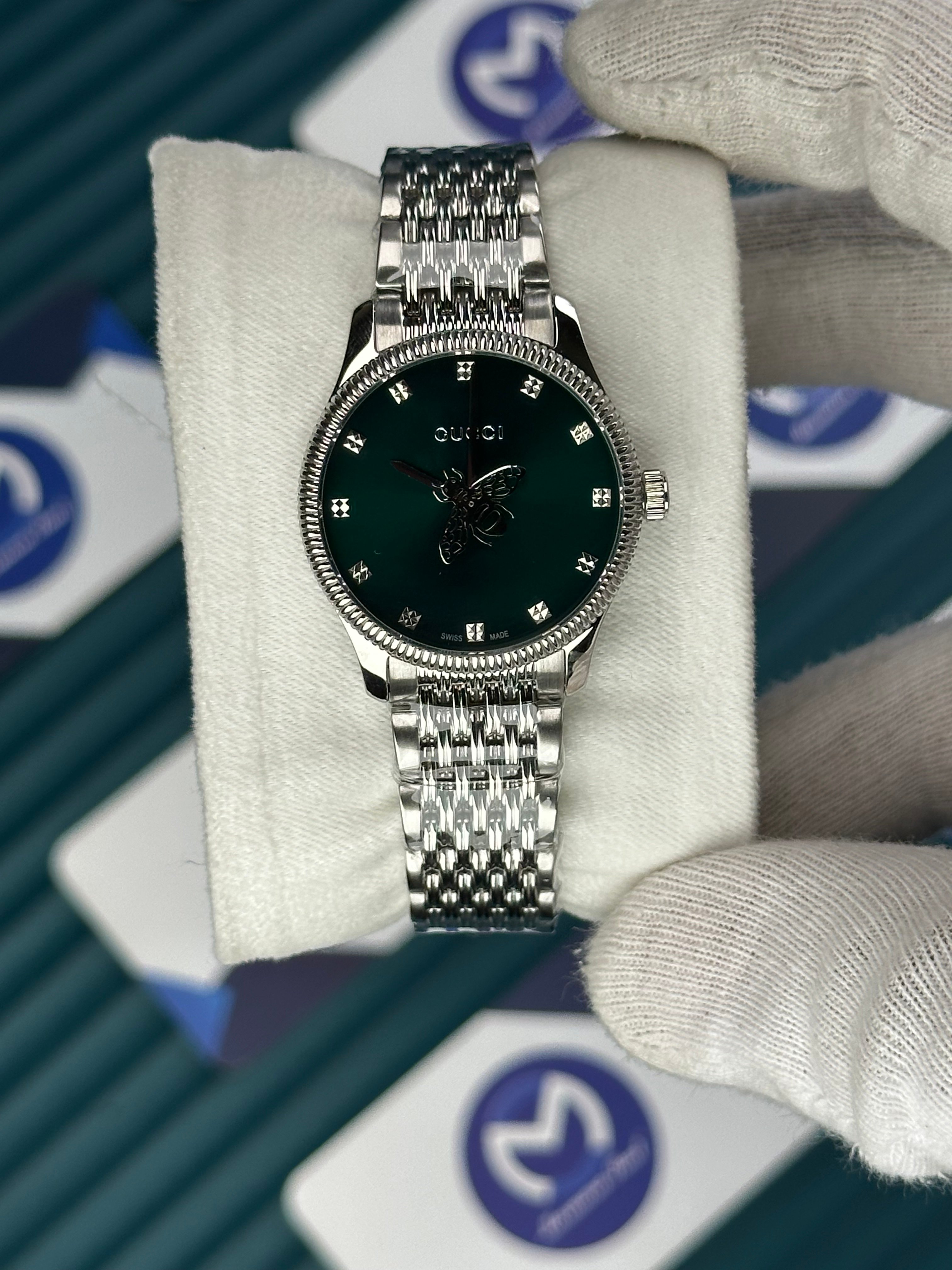 GUCCI GREEN DIAL SPINNING BUTTERFLY SILVER