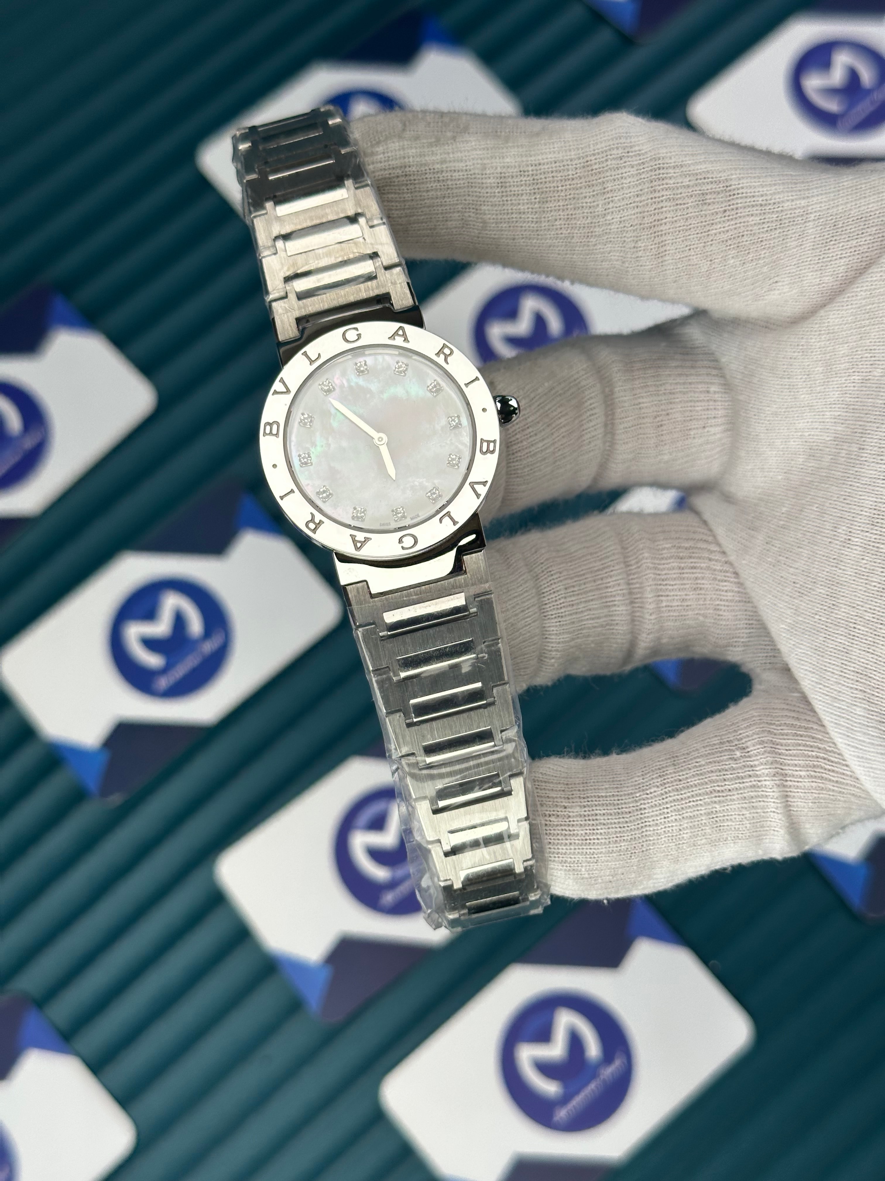 BVLGARI PEARLESCENT WHITE DIAL SILVER BEZEL DIAMOND INDEX SILVER CORD