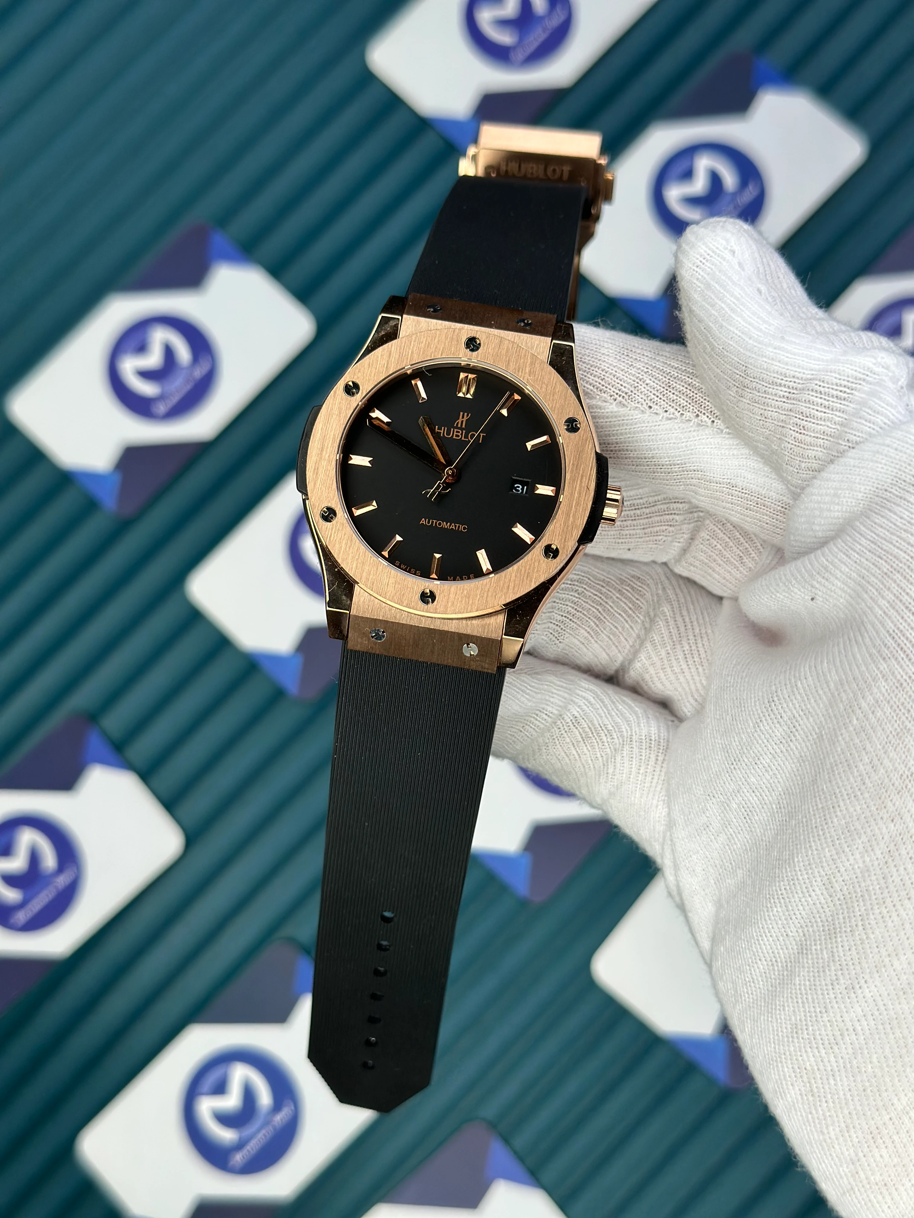 HUBLOT GENEVE AUTOMATIC VENDOME BLACK DIAL ROSE BEZEL BLACK CASE BLACK RUBBER CORD 