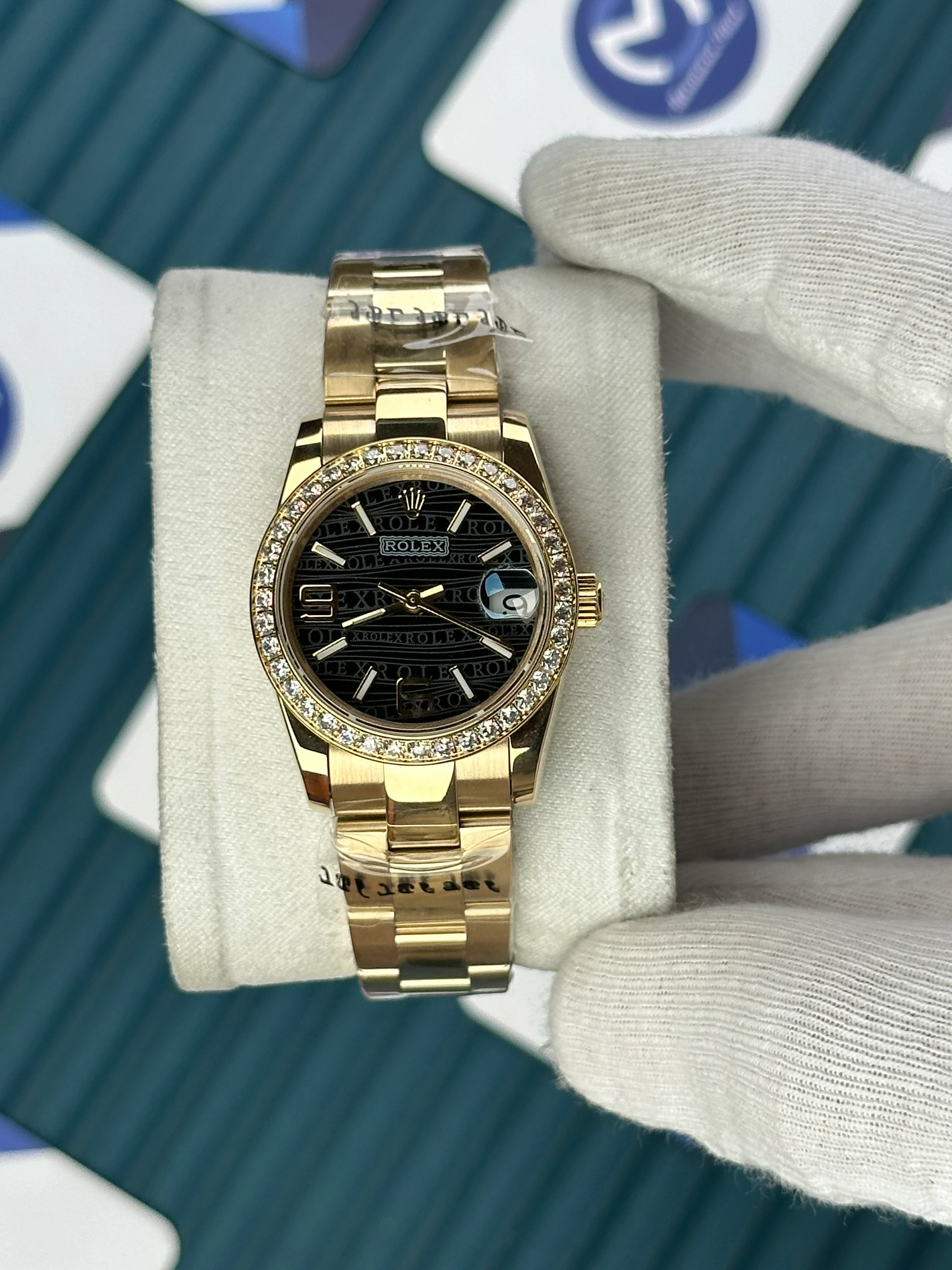 ROLEX 31 MM DATEJUST BLACK PATTERNED DIAL ROD INDEX DIAMOND BEZEL GOLD OYSTER 