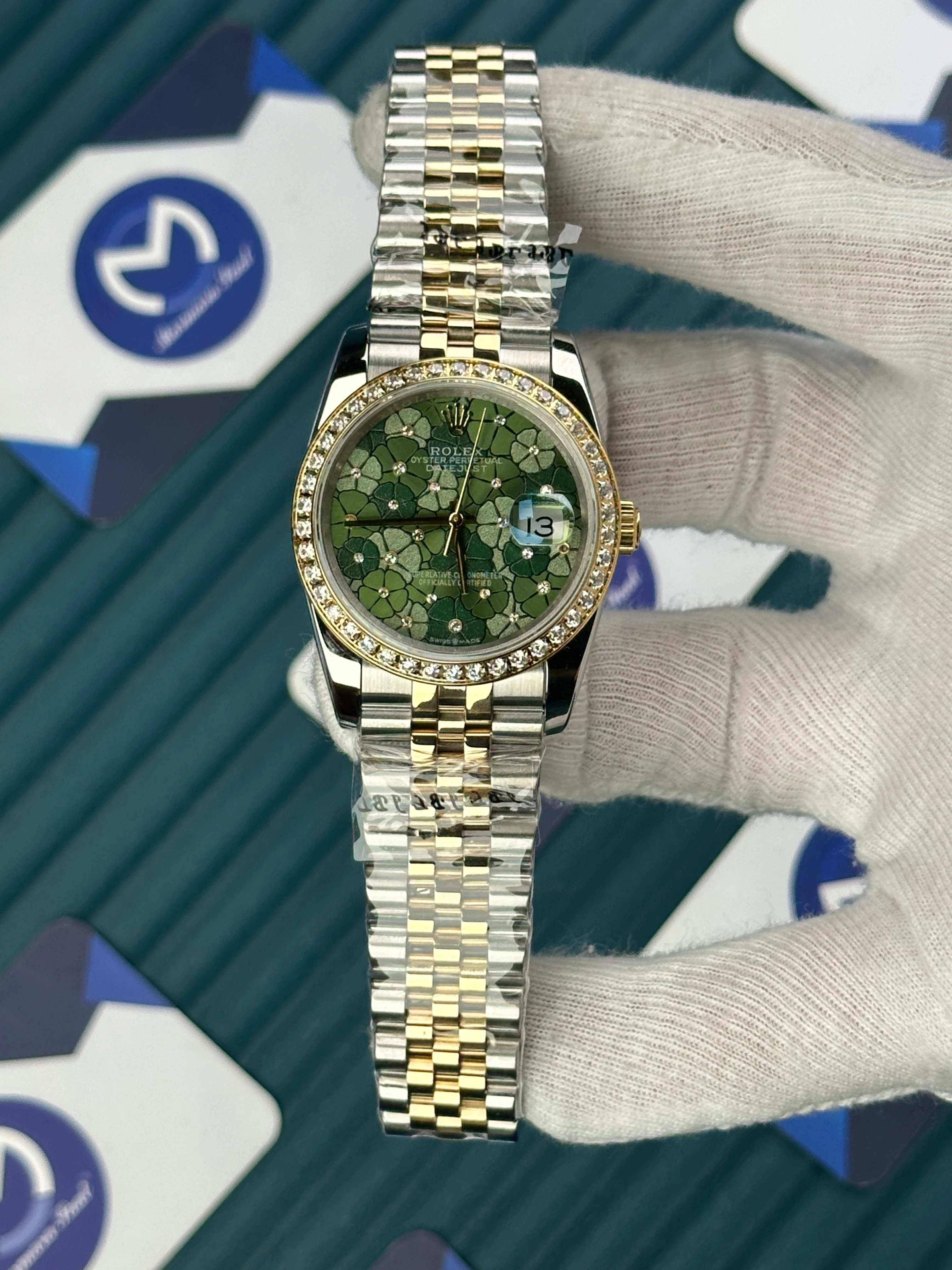 ROLEX 36 MM DATEJUST GREEN LEAF DIAL DIAMOND BEZEL GOLD-SILVER JUBILE 