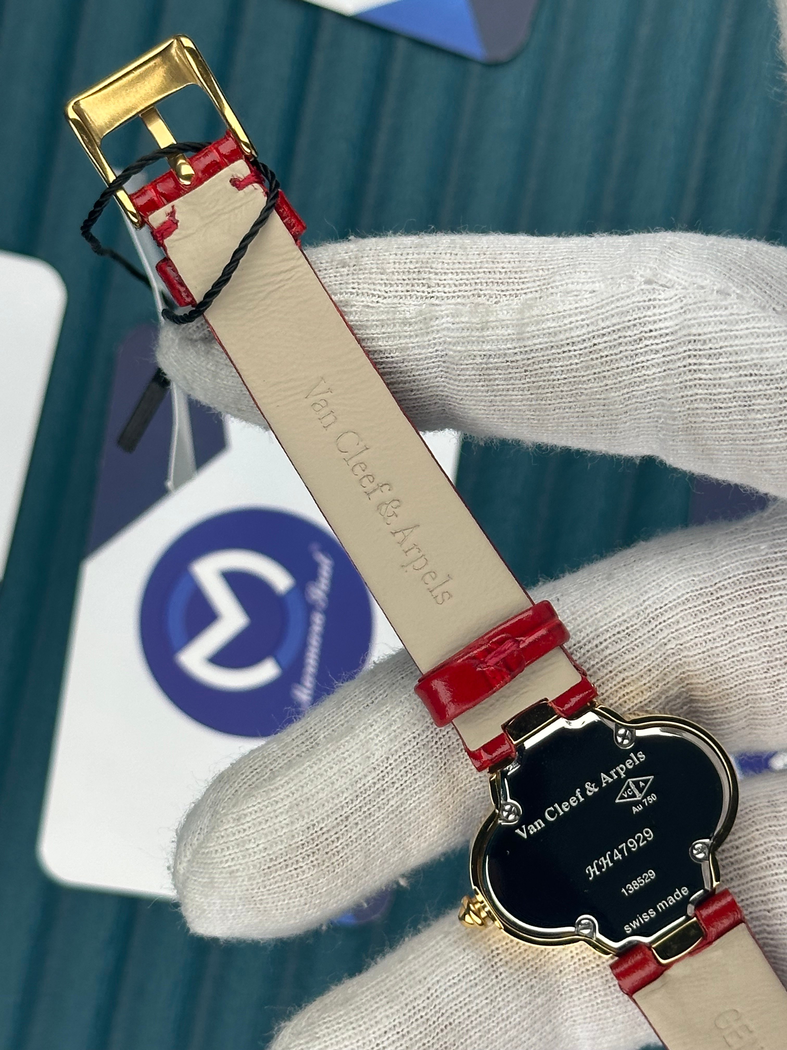 VAN CLEEF & ARPELS WHITE DIAL DIAMOND BEZEL GOLD CASE RED LEATHER CORD