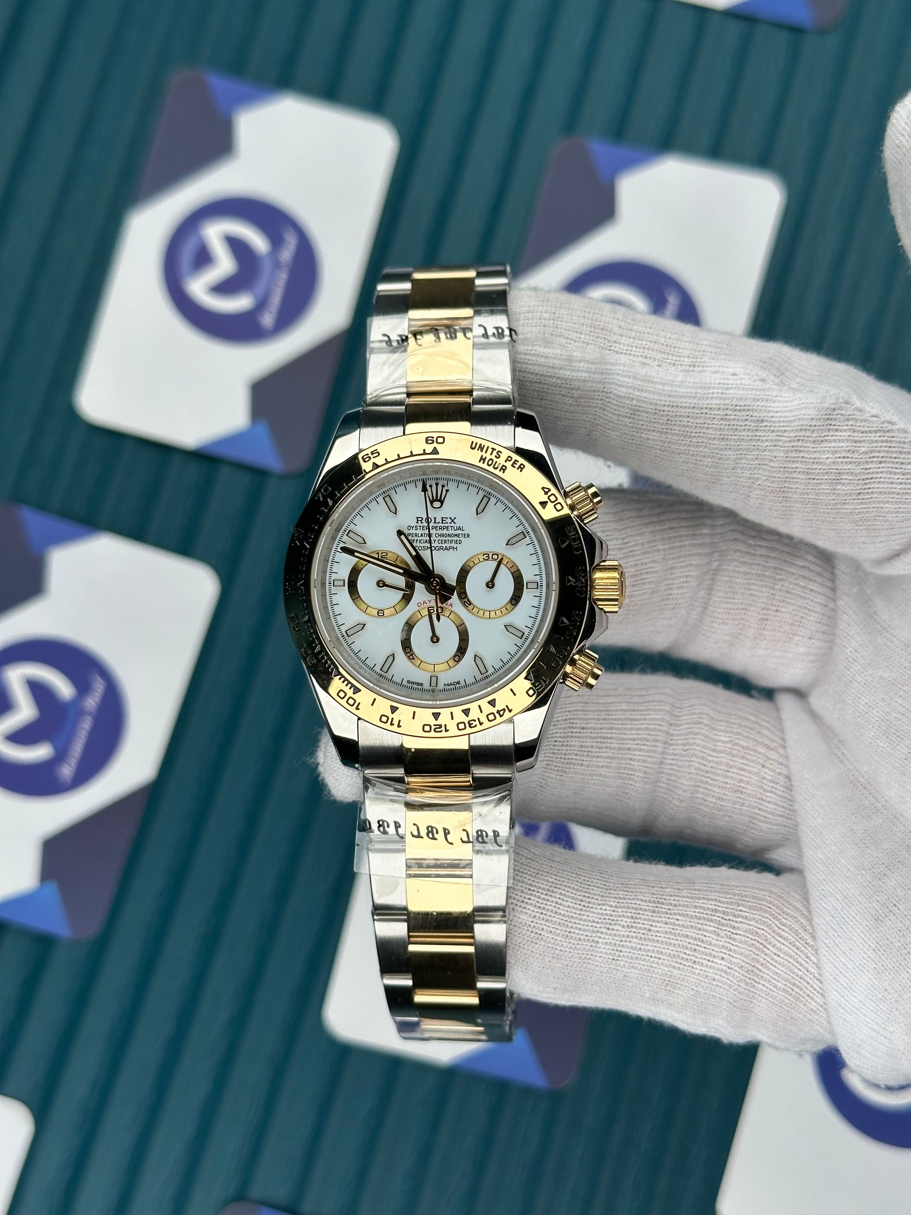 ROLEX DAYTONA WHITE DIAL GOLD BEZEL GOLD-SILVER OYSTER