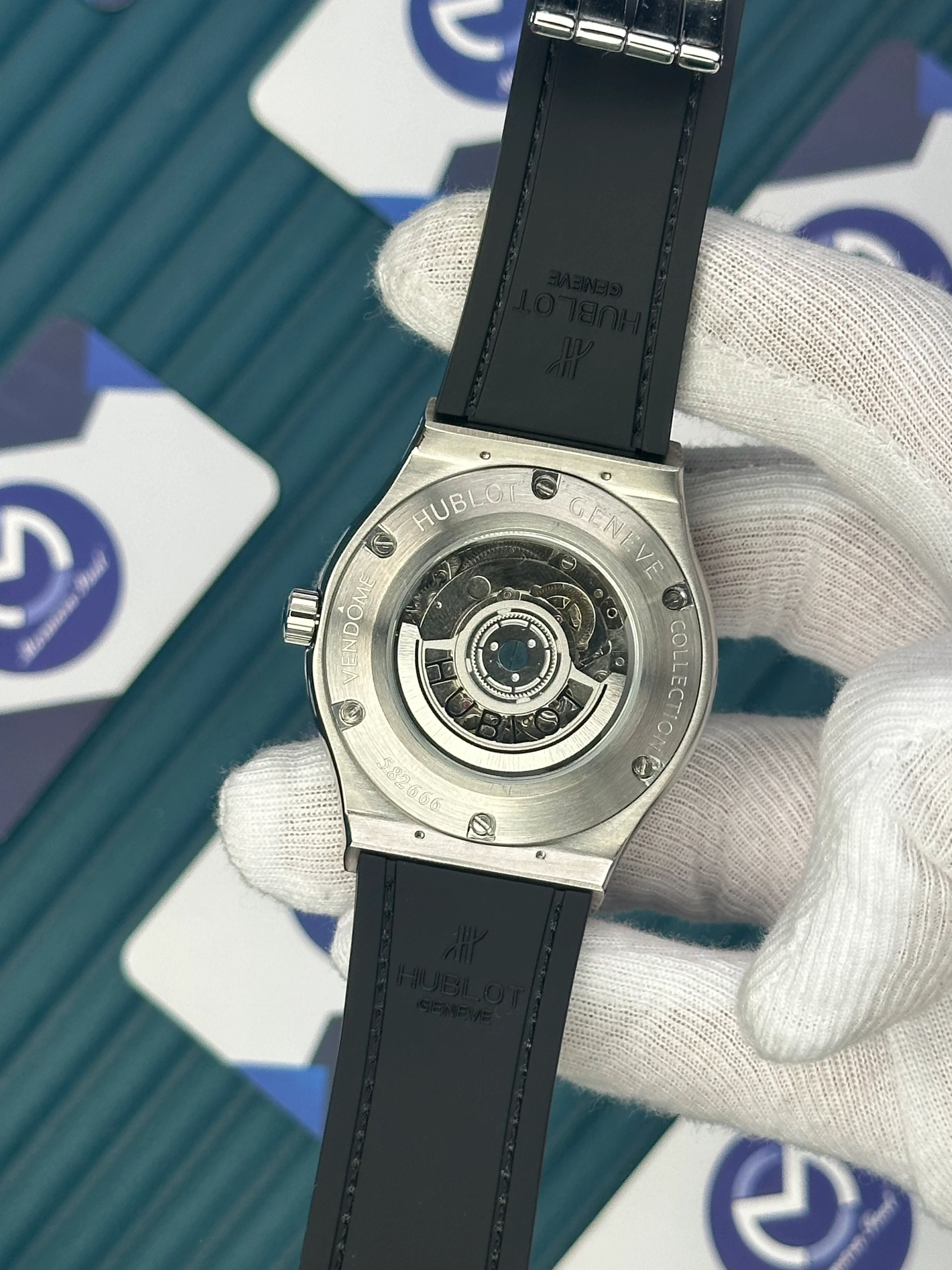 HUBLOT GENEVE AUTOMATIC VENDOME BLUE DIAL SILVER CASE BLUE LEATHER CORD 